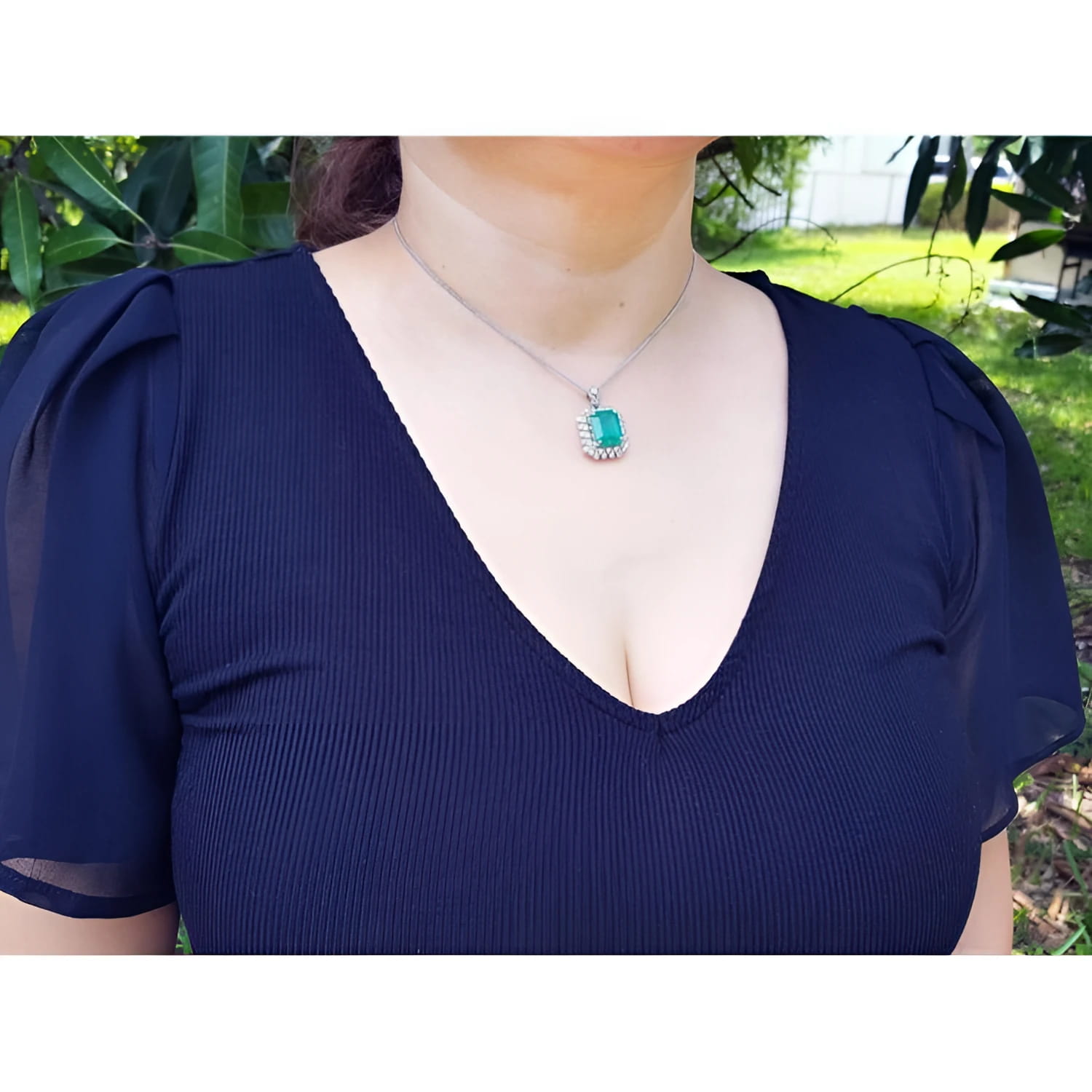 7.78 ct natural emerald pendant with double halo diamonds in 14K white gold, antique-inspired design.