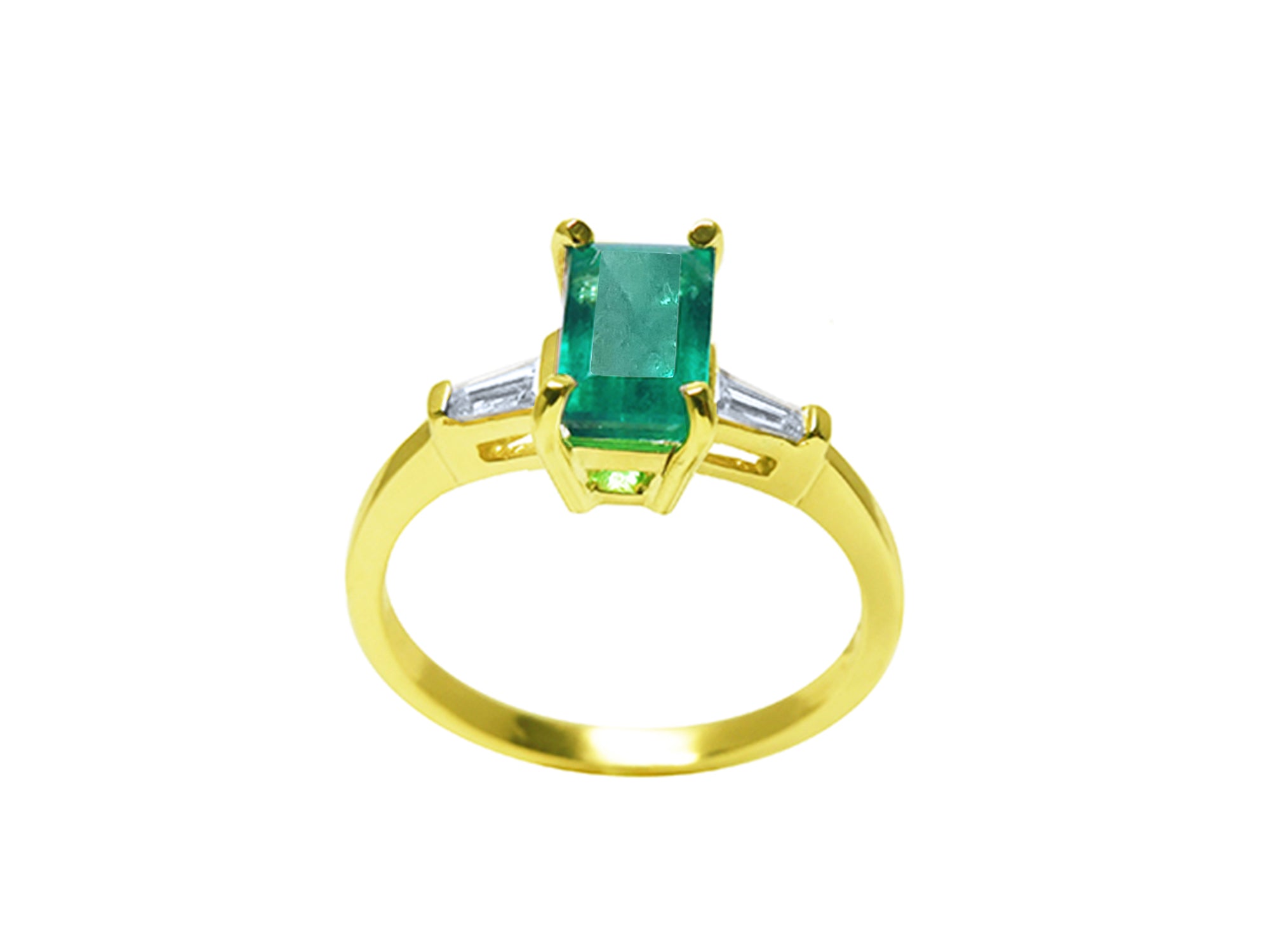 14k yellow gold ring with a natural colombian emerald on a white background.