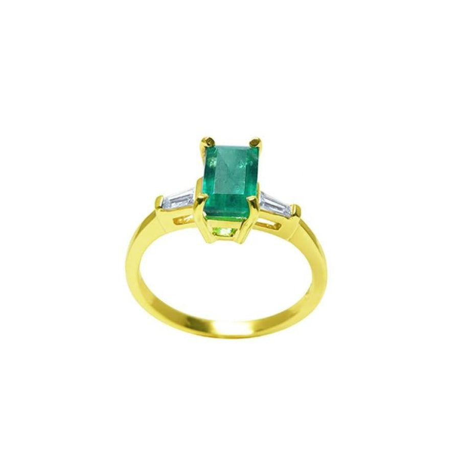1.05 ct natural emerald ring with side baguette diamonds in 14K yellow gold.