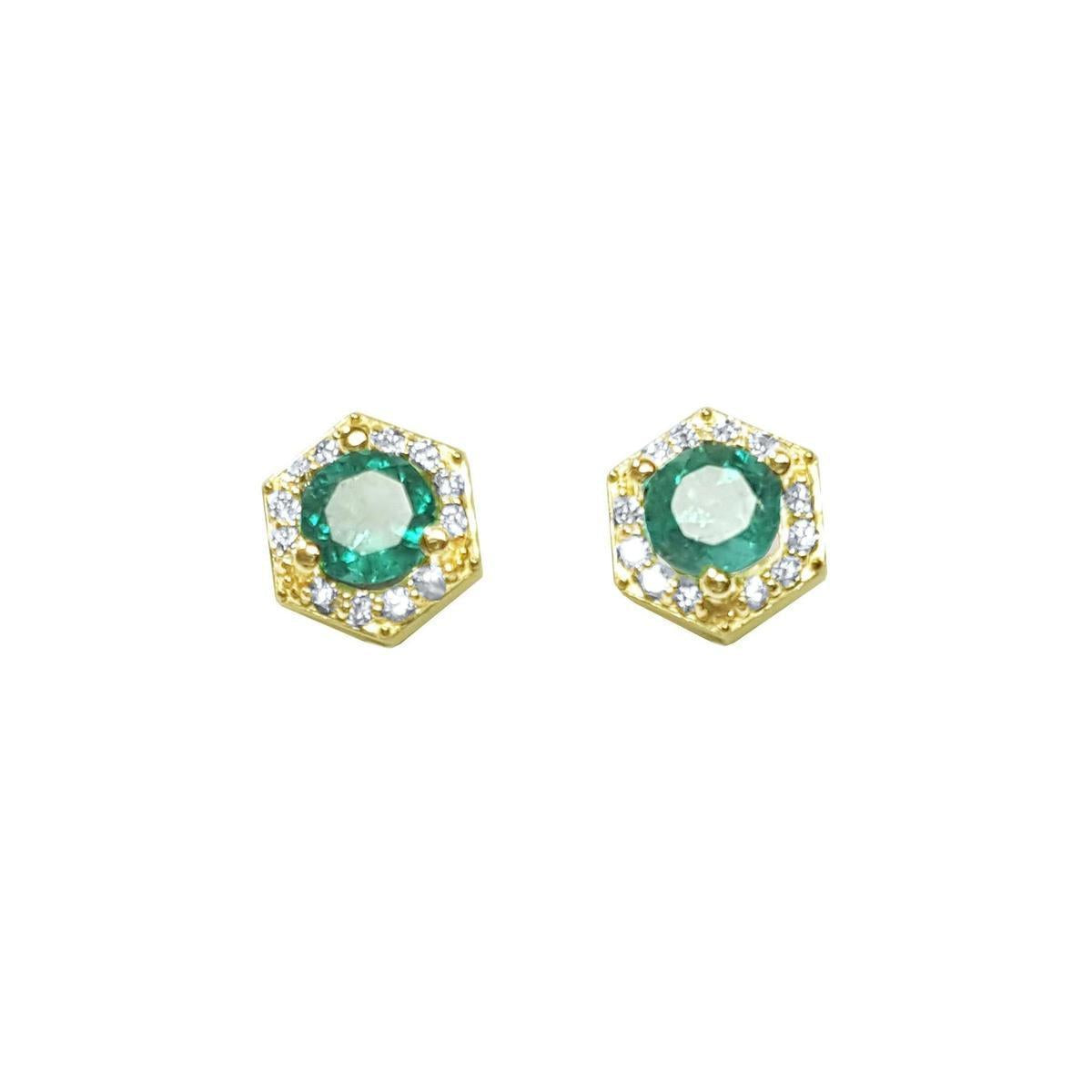 A pair of round emerald cocktail-style stud earrings with a halo of natural diamonds, set in yellow gold.