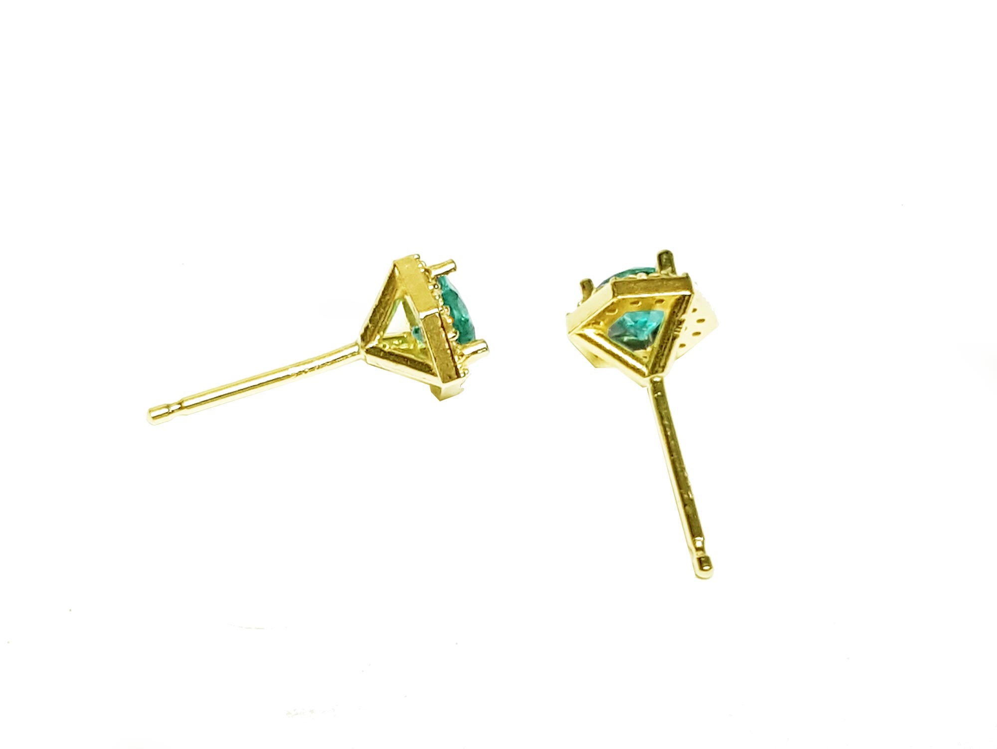 Pair of push backs emerald stud earrings yellow gold underside view.