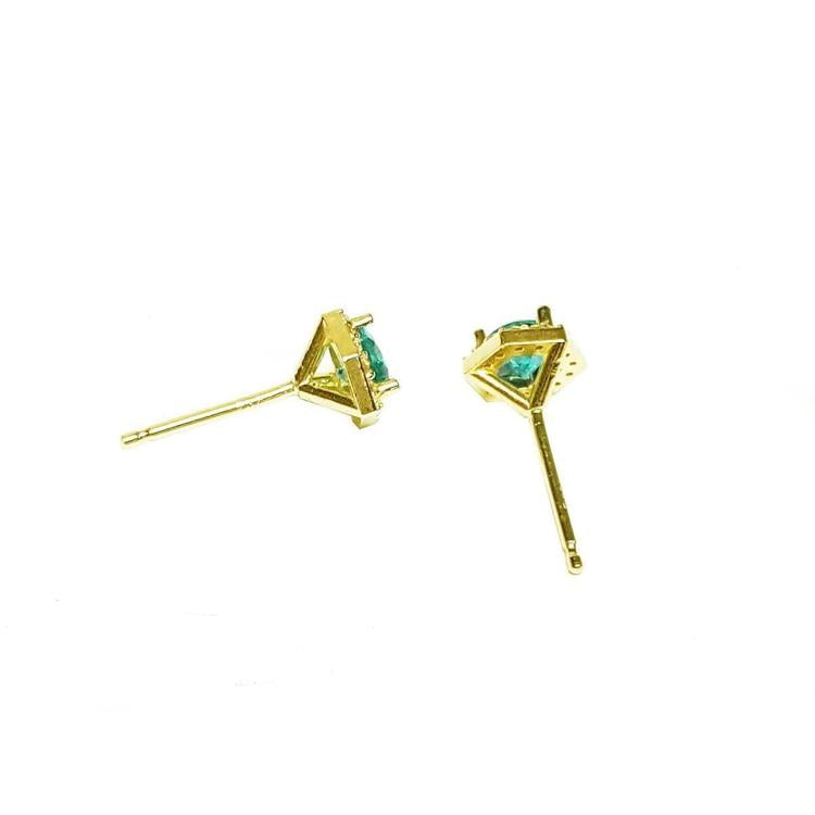 Hexagon emerald and diamond stud earrings in 14K yellow gold.