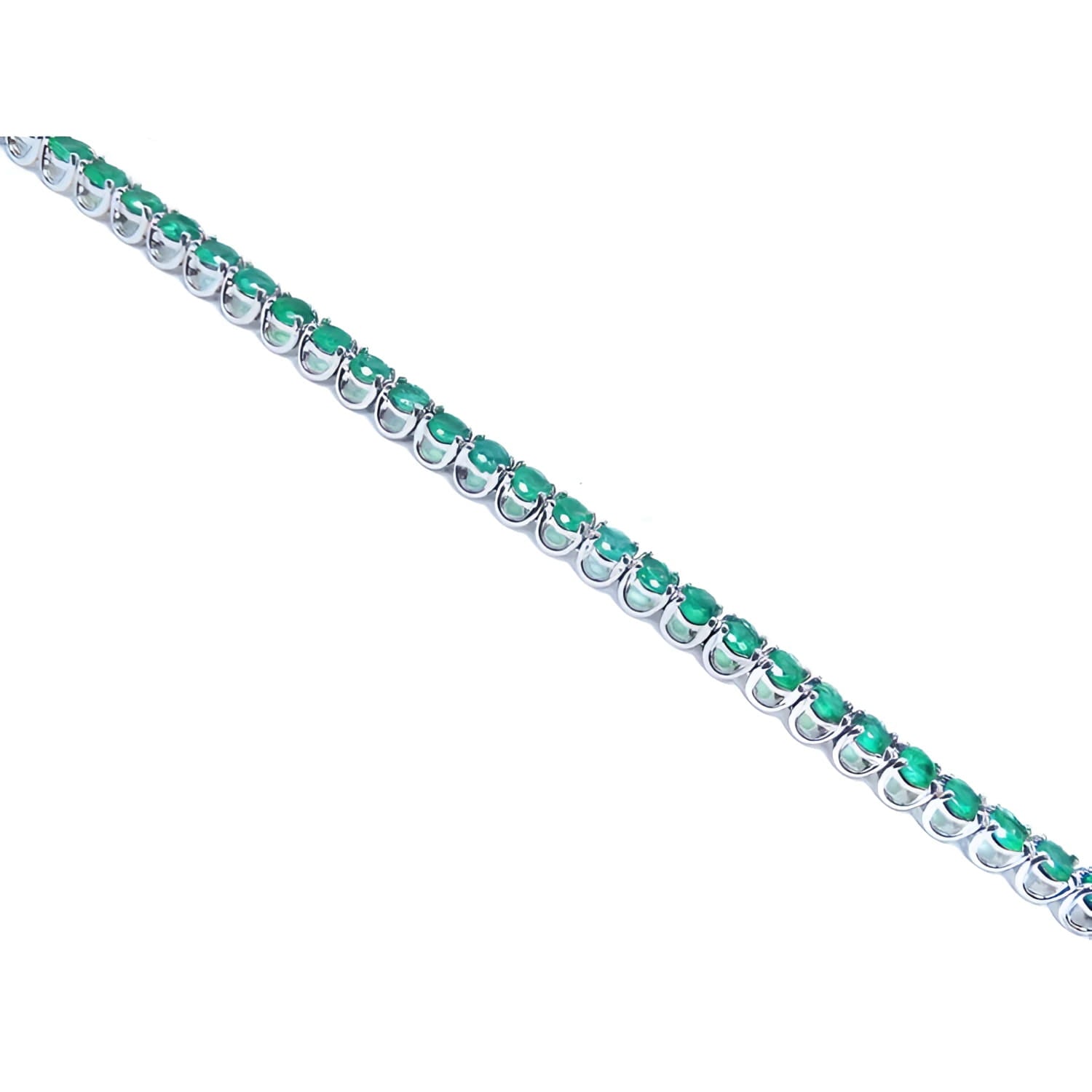 Colombian emerald tennis bracelet with round green emeralds in 14K white gold.