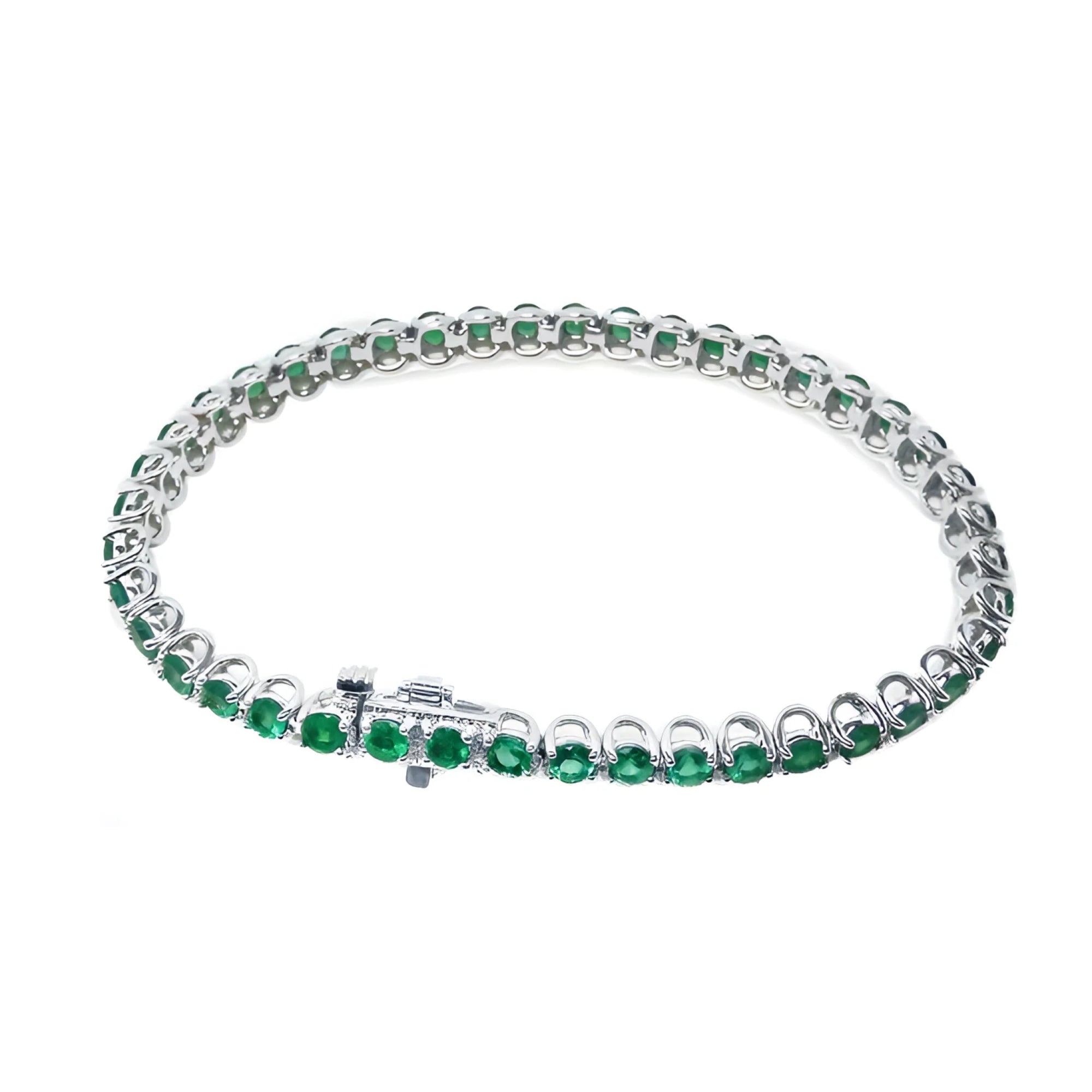 Colombian emerald tennis bracelet with round, deep green emeralds in 14K white gold.