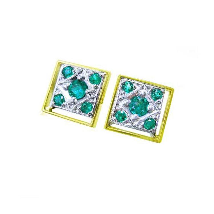 Pair of diamond-shaped cufflinks for men with round cut natural emeralds on a topside view display.