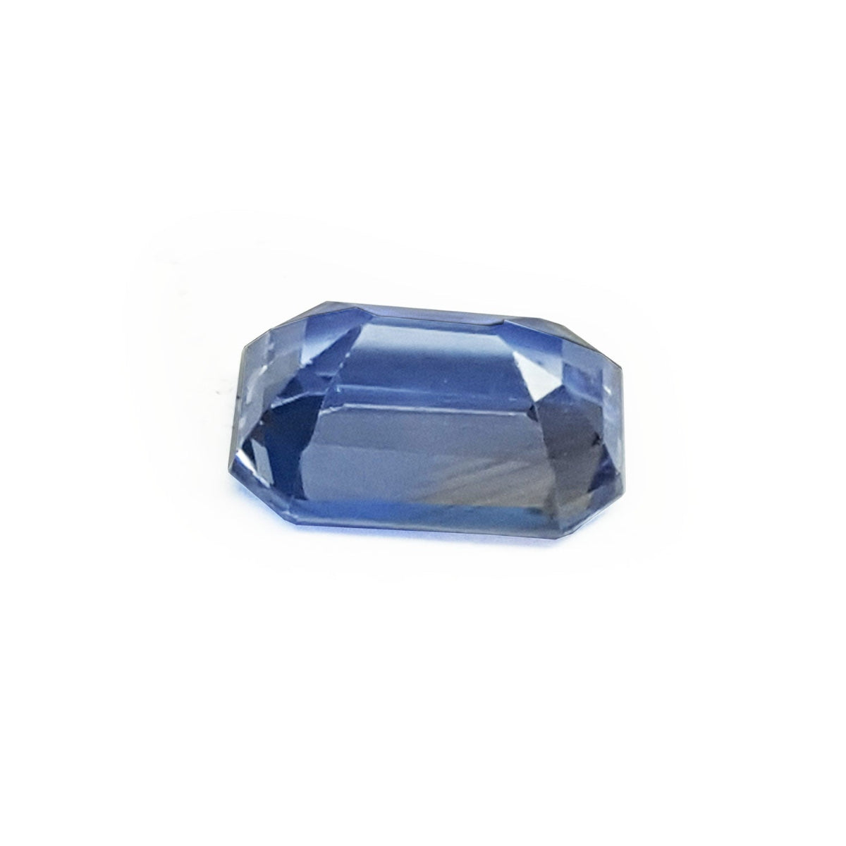 Natural loose sapphire emerald-cut, upside down pavilion exposed