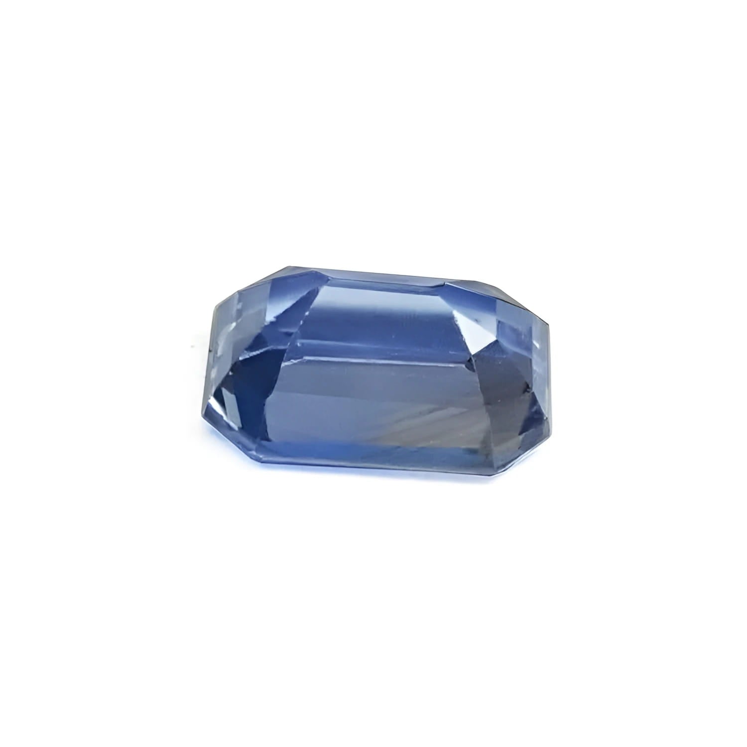 Sparkling 1.31 ct natural loose blue sapphire gemstone with emerald cut.