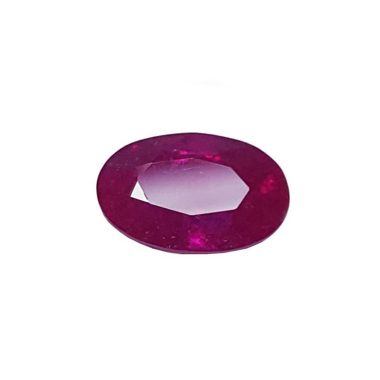 2.12 carat loose natural ruby, oval cut, rich red medium deep sparkling color.