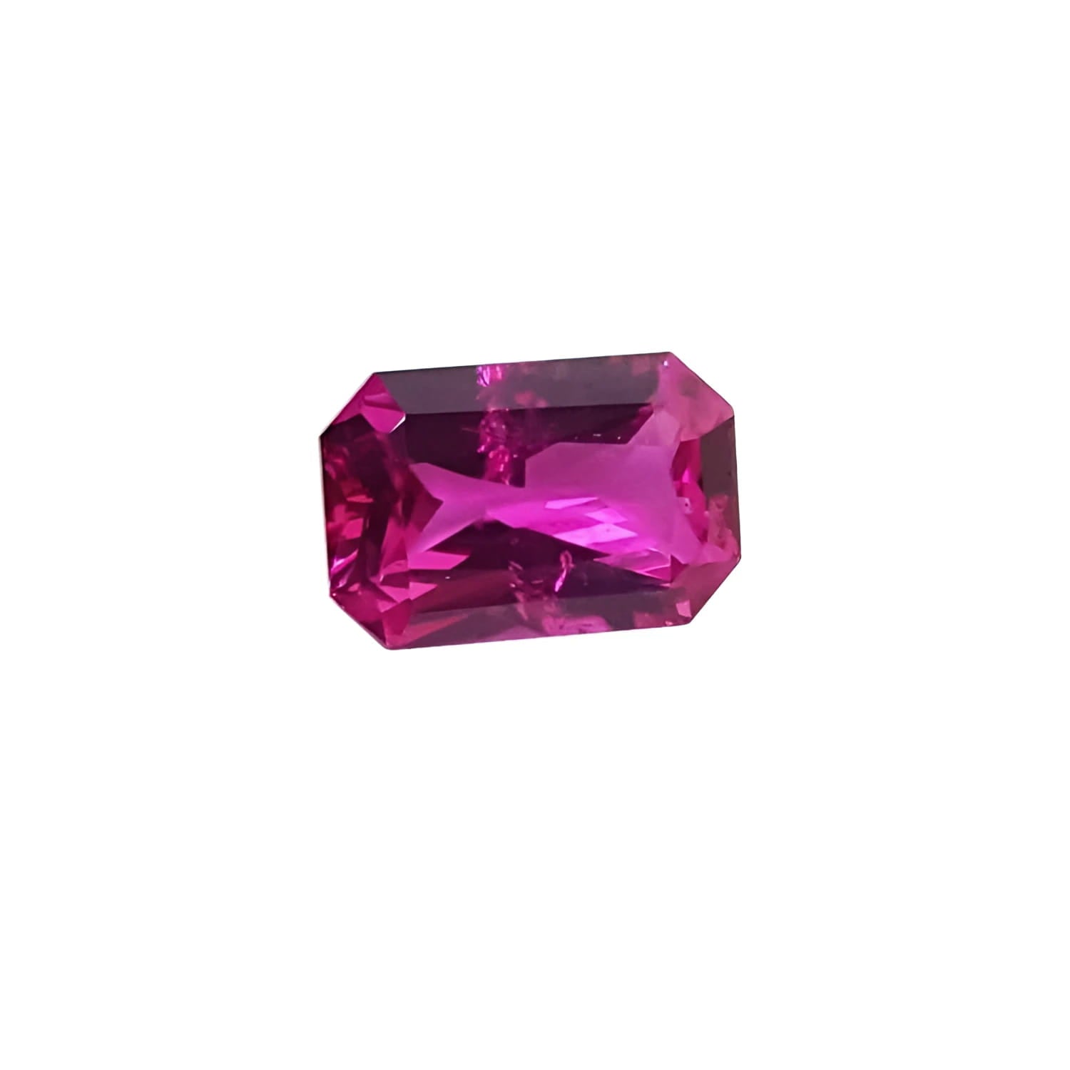1.38 ct GIA certified loose natural purplish pink sapphire, modified fancy emerald-cut.