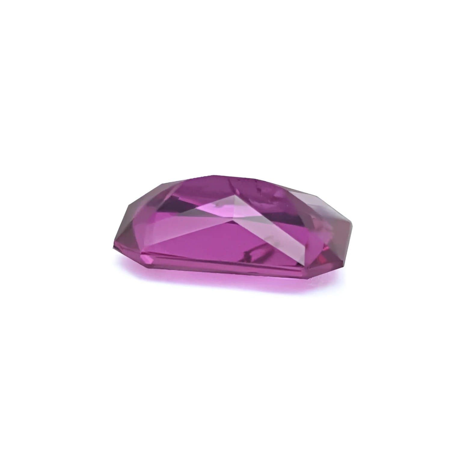 GIA certified 1.38 ct purplish pink sapphire, modified fancy emerald-cut.