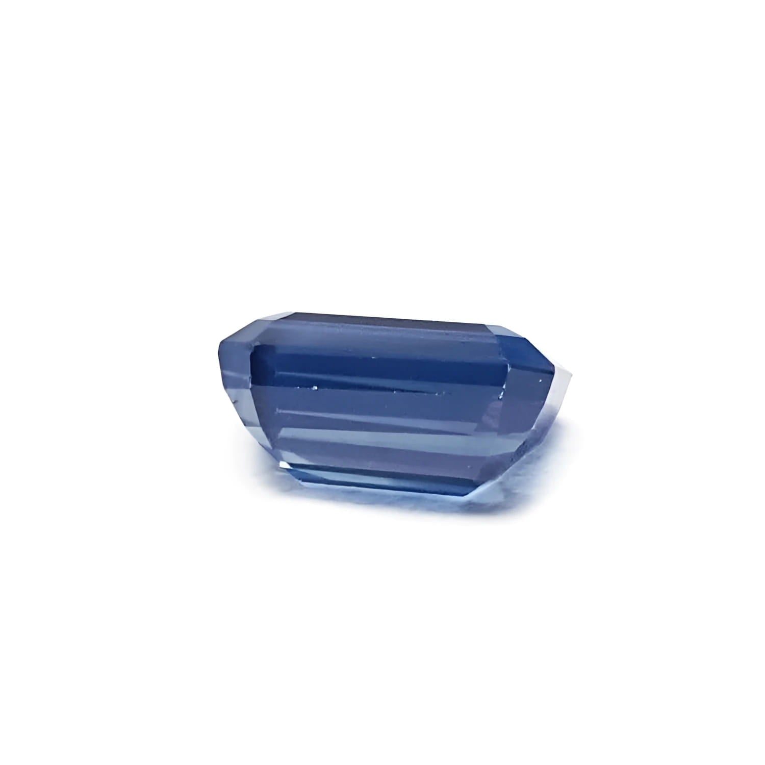 5.05 ct GIA certified deep blue-green emerald cut natural loose sapphire.