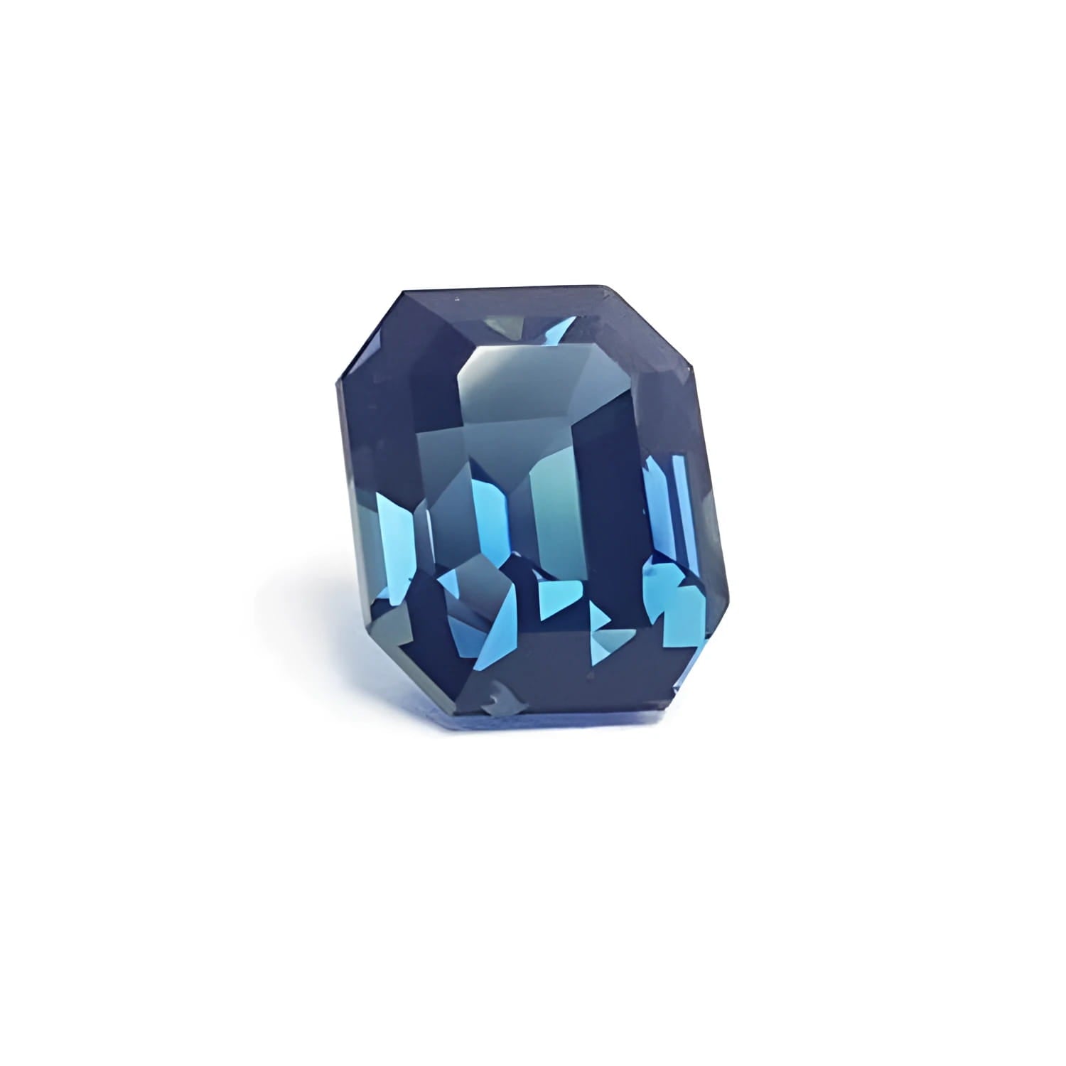4.52 ct. natural untreated deep blue-green sapphire with an emerald cut.