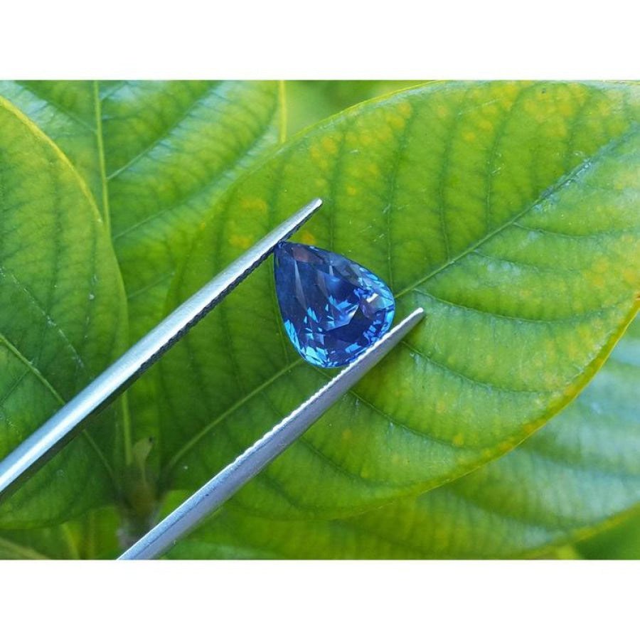 3.67 ct. Loose natural blue sapphire pear cut, showcases a vivid, deep blue hue with remarkable brilliance.