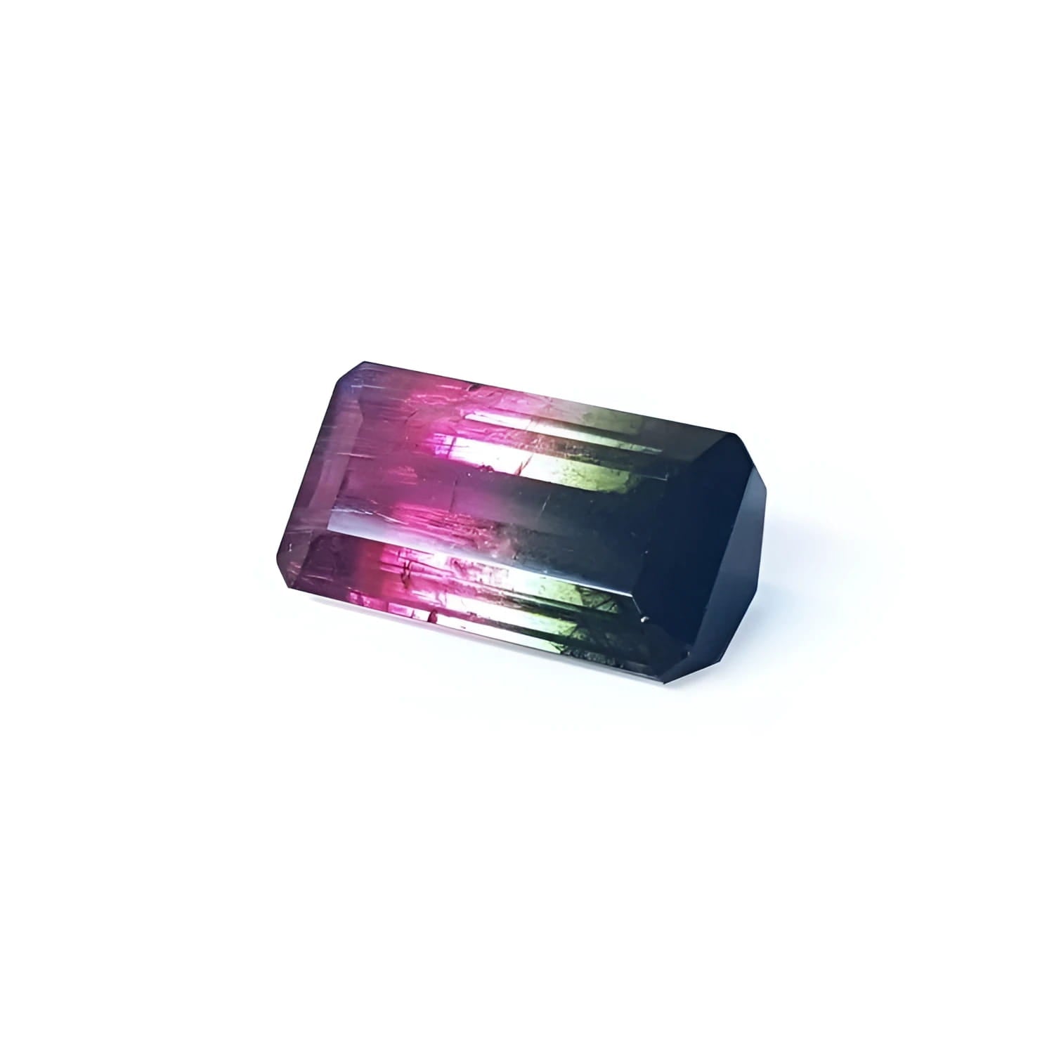 Emerald cut 6.11 ct natural loose watermelon tourmaline with deep bluish green and red-orange colors.