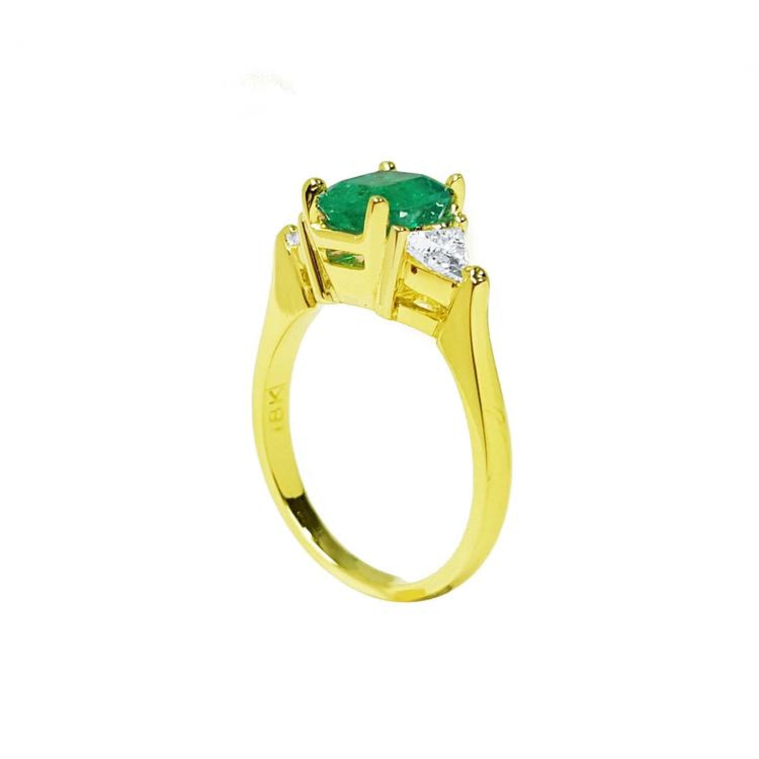 18K yellow gold three-stone ring with a natural Colombian emerald and two trillion-cut diamonds.