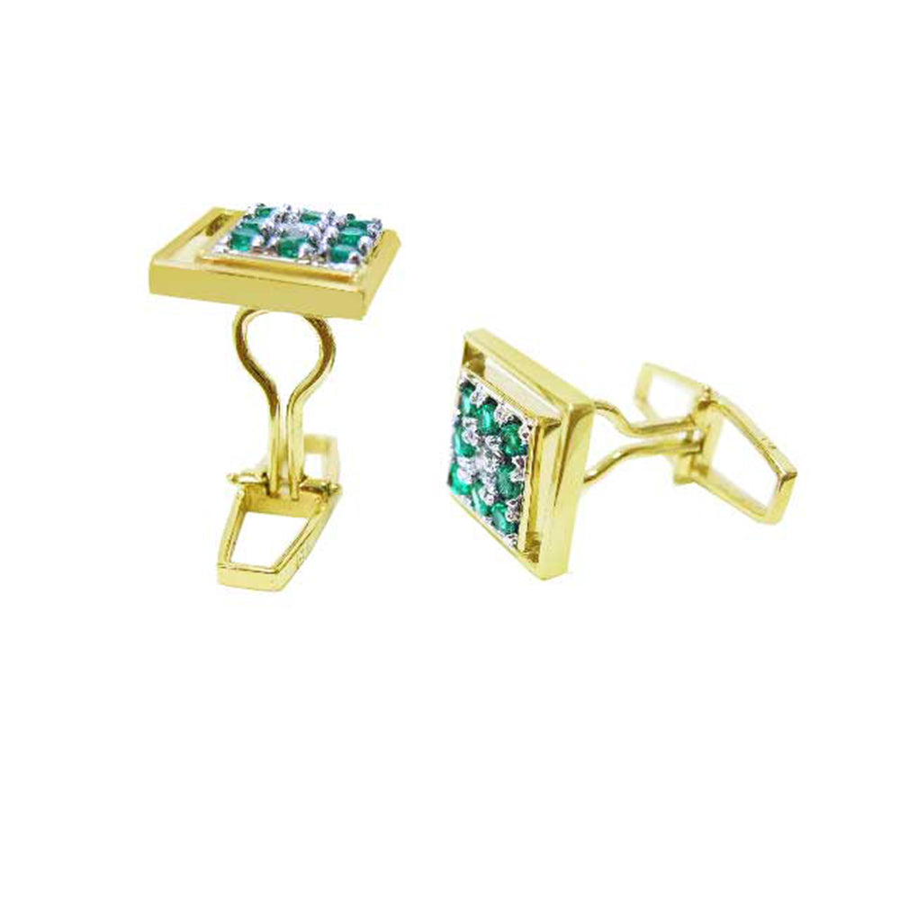 Gold cufflinks with natural emeralds displaying its side profile on a white background.