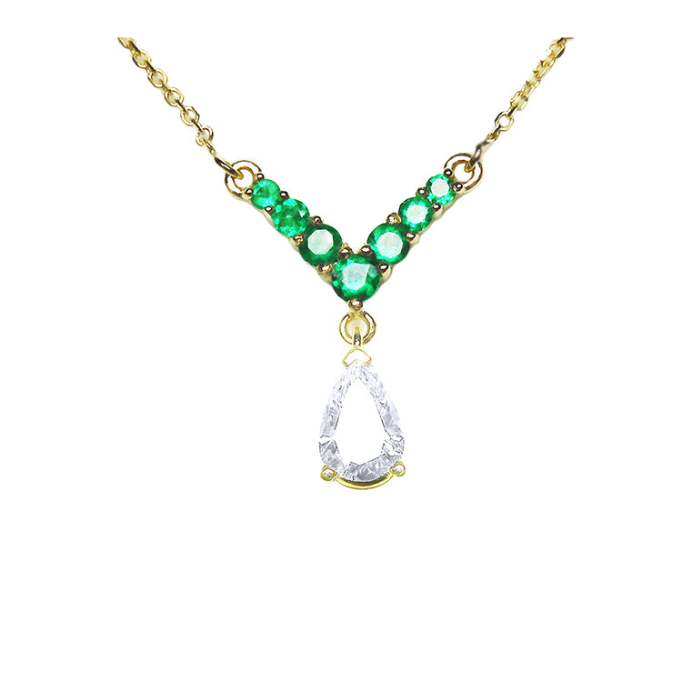 Emerald necklace with a natural diamond tear drop weighting 0,69 carats dangling from a V shaped with round cut emeralds 