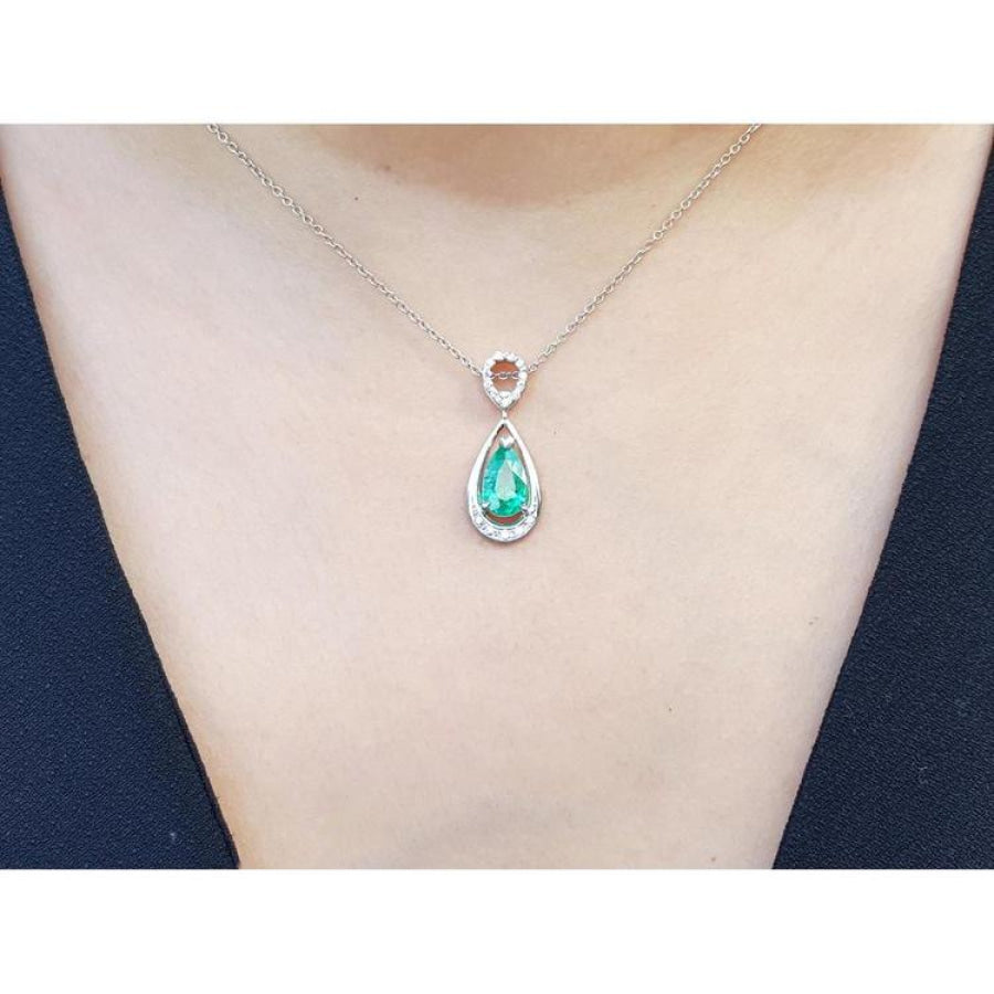 1.35 ct natural emerald pear pendant necklace with diamond bail on 14K white gold chain.