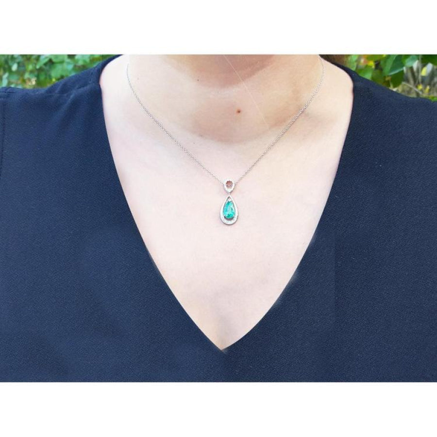1.35 ct natural pear-shaped emerald pendant necklace with diamond bail on 14K white gold chain.