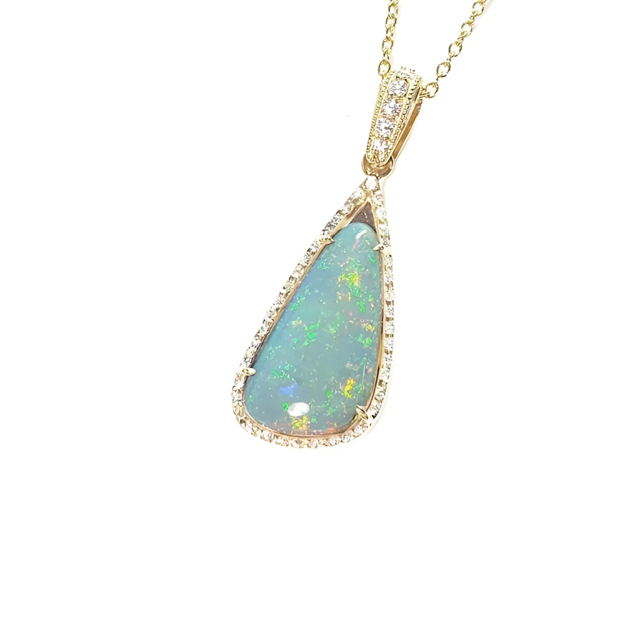 Pear-shaped 8.05 ct Australian opal pendant with bluish-green play of color, halo diamonds, and 18K yellow gold chain.