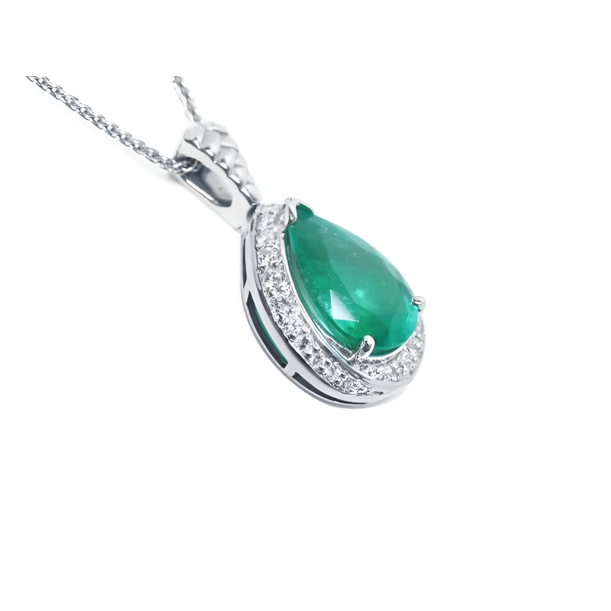 Pear-shaped natural emerald pendant with diamond halo and 14K white gold chain.