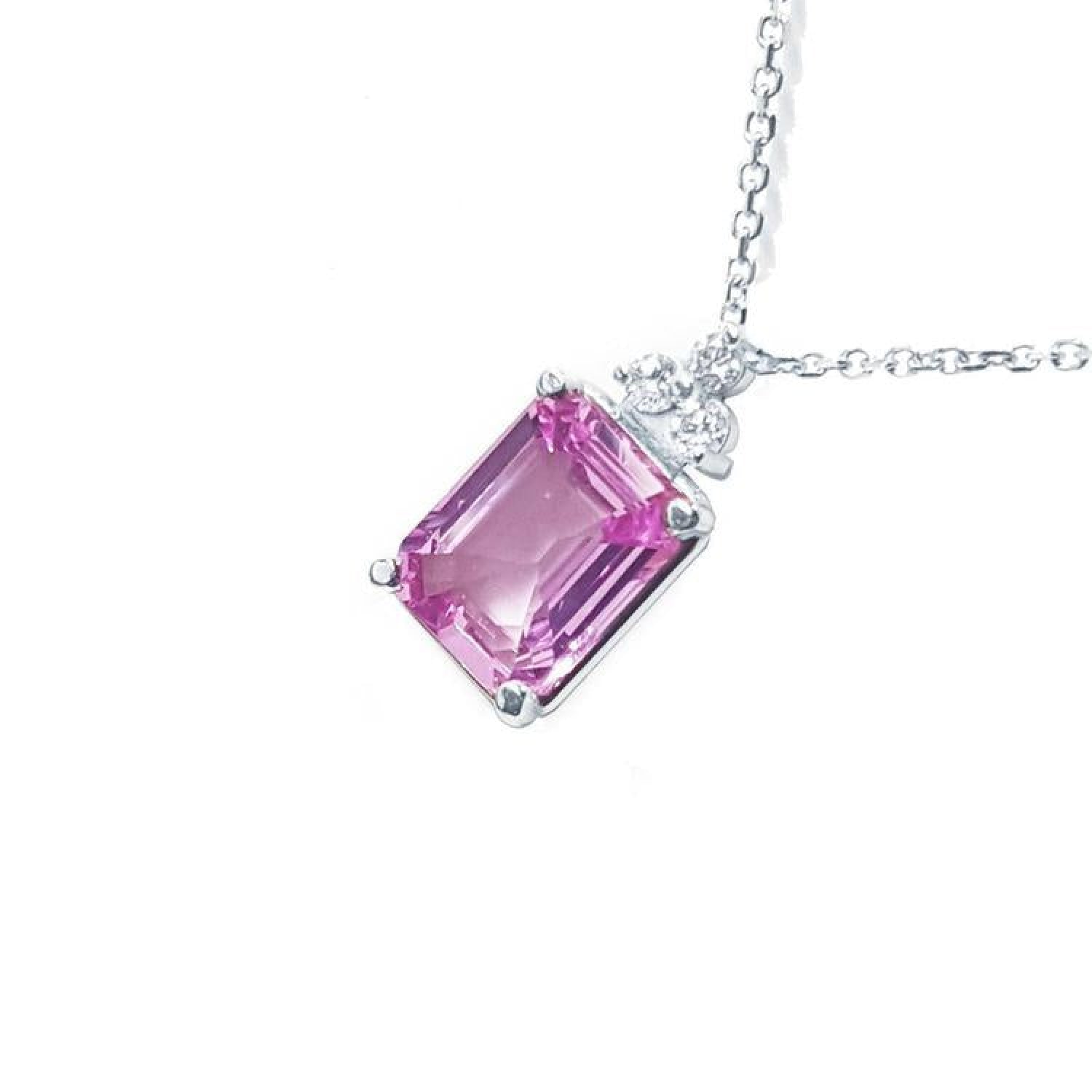 2.01 ct. natural pink sapphire emerald cut necklace in 14K white gold with diamond accents.