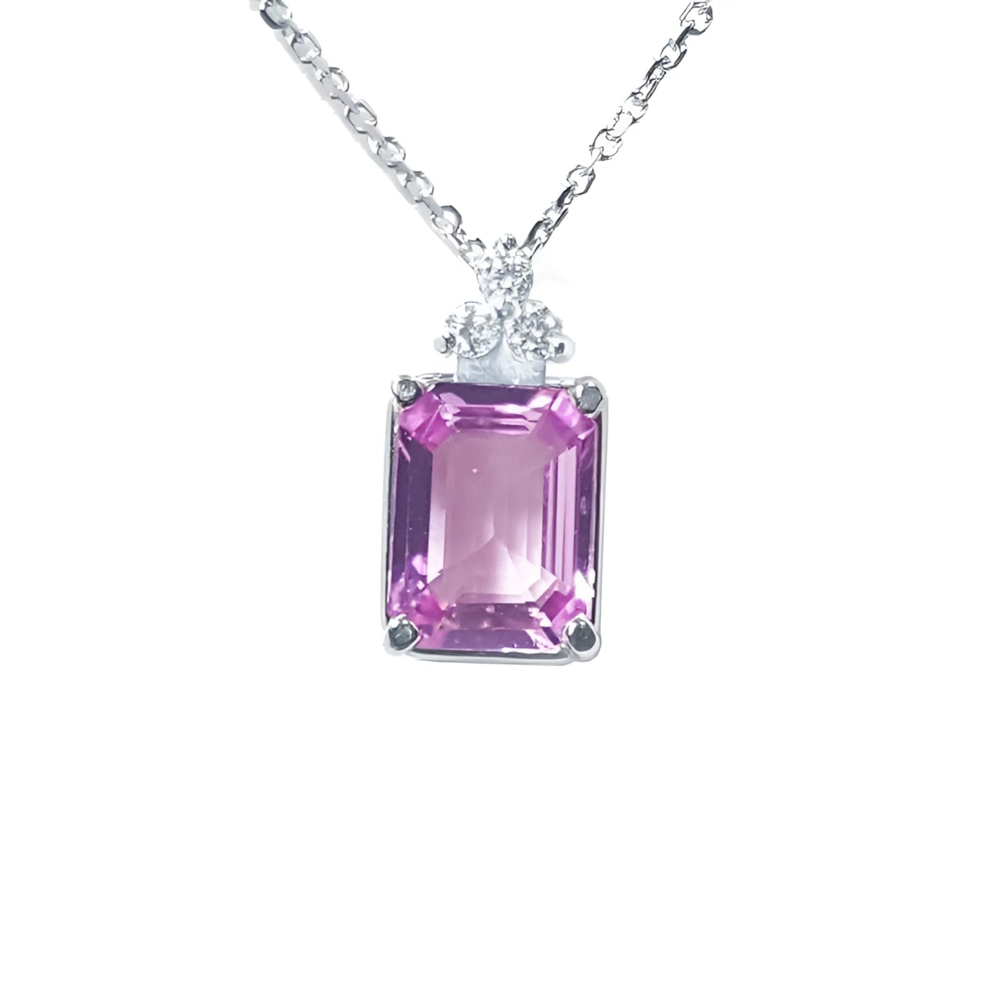 Natural pink sapphire pendant necklace emerald cut medium light color, eye clean and very brilliant set in 14k white gold.