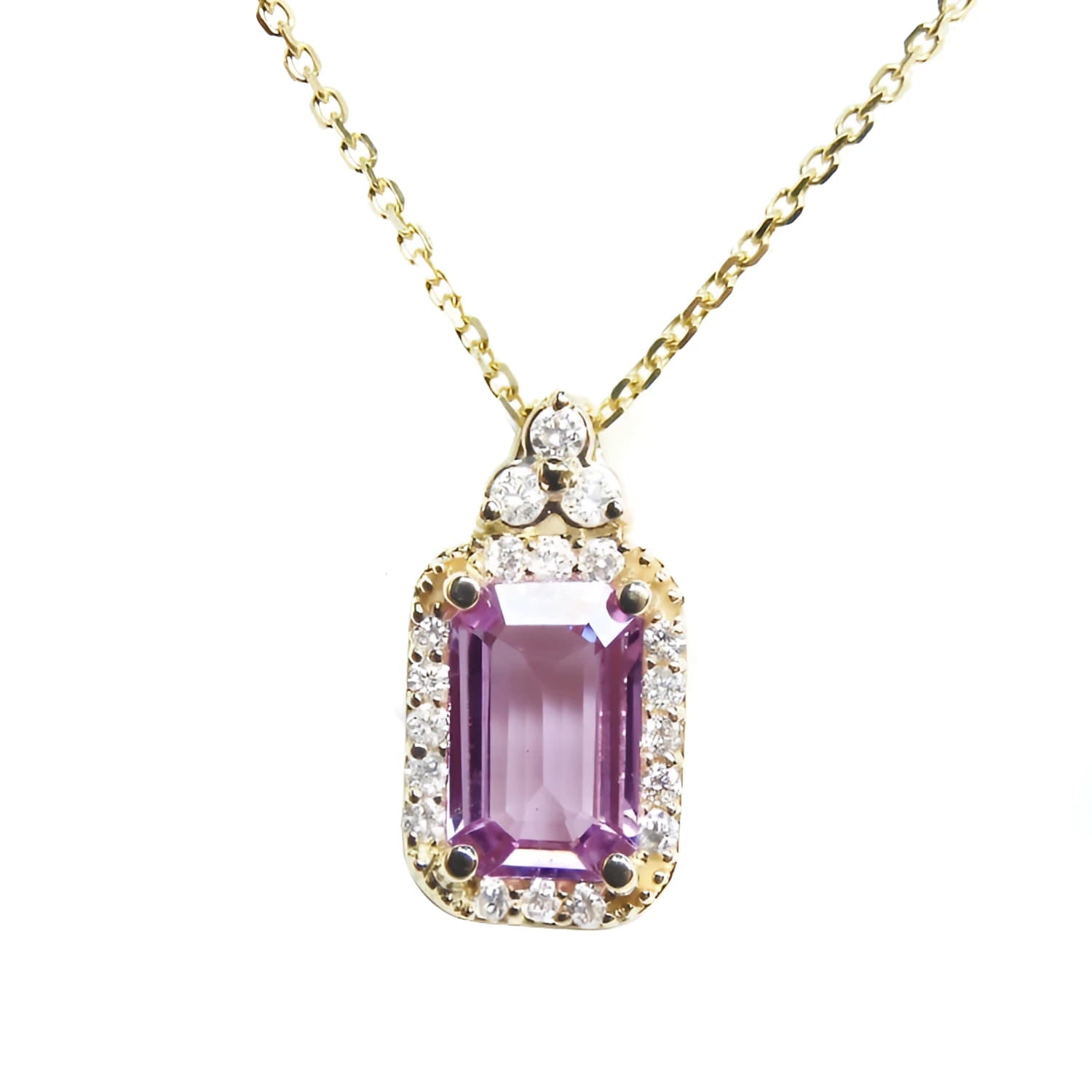 Natural pink sapphire necklace pendant rectangular emerald cut in a medium light hue, surrounded by a halo of natural diamonds and set in 14k gold.