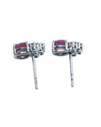Natural pink sapphire cabochon oval cut stud earrings, prong set in 14k white gold.