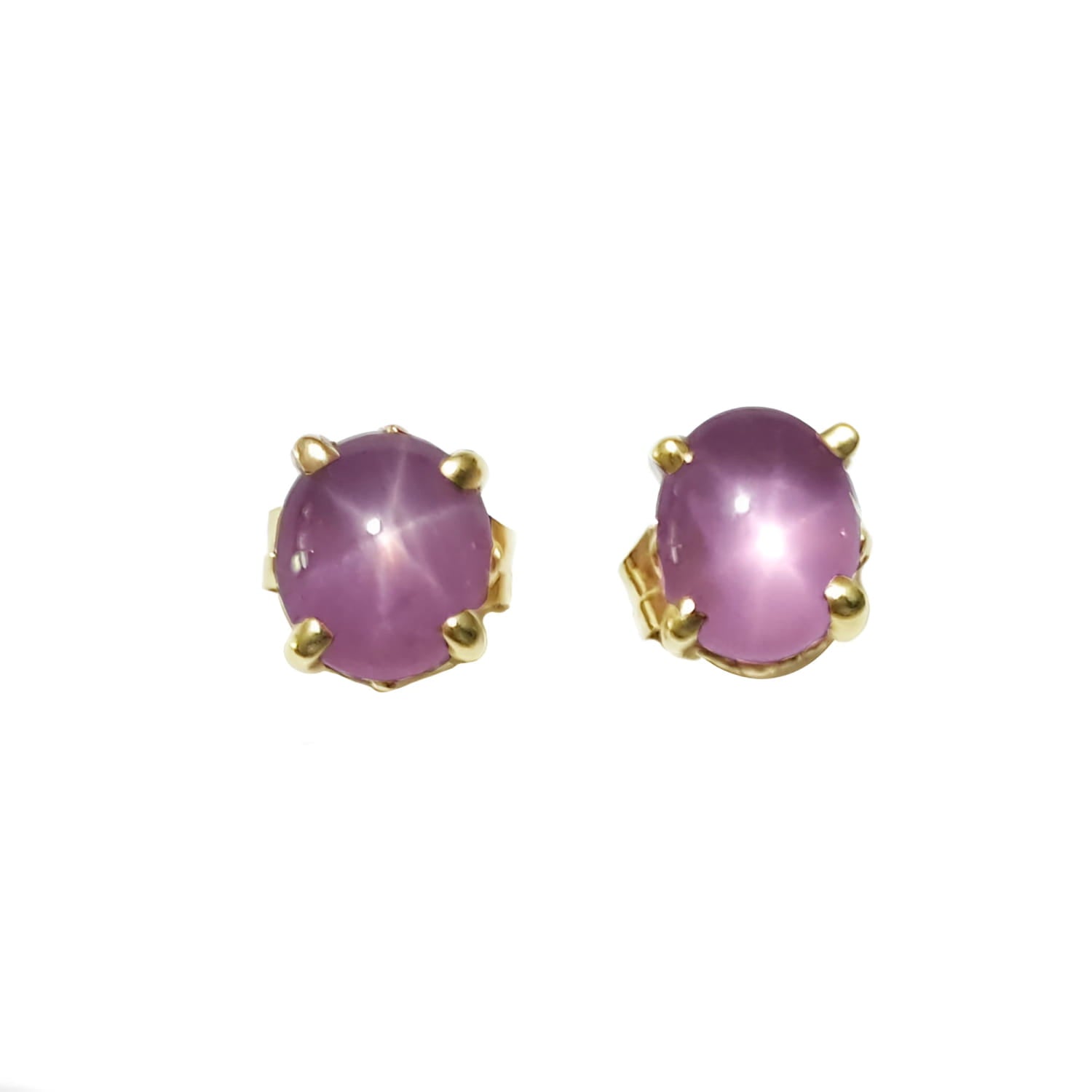 Pair of natural pink sapphire cabochon oval cut stud earrings, sparkling medium pink color, only under a LED light bulb it appears the star effect.