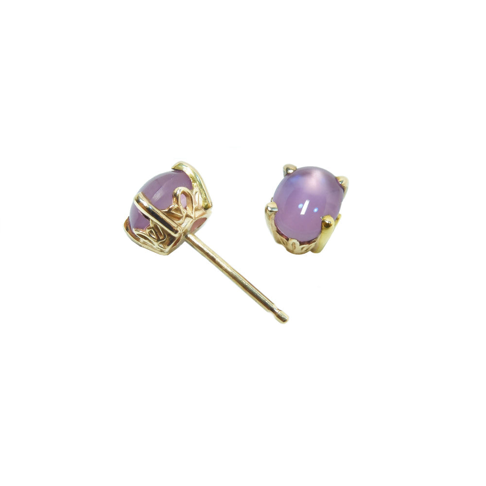 A pair of natural pink sapphire cabochon oval cut stud earrings, sparkling medium pink color, push backs, crafted in 14k gold.