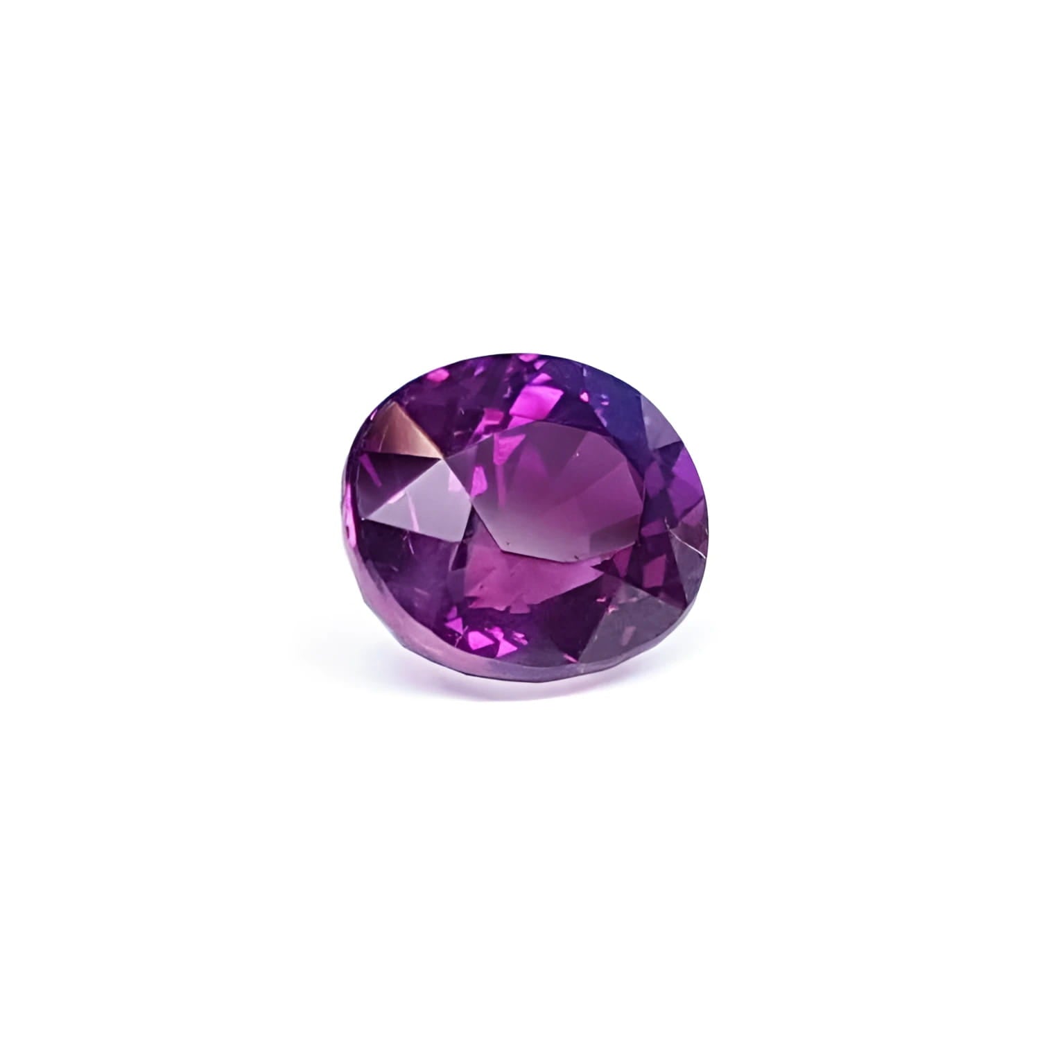 2.59 ct natural pink sapphire, oval cut, intense vivid deep purple-pink color with strong sparkle.