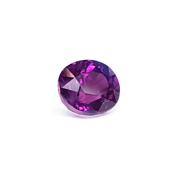 2.59 ct natural pink sapphire, oval cut, intense vivid deep purple-pink color with strong sparkle.