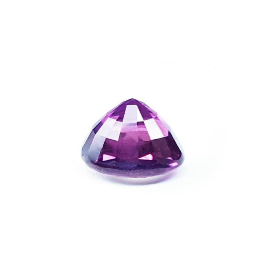 2.59 ct natural pink sapphire, intense vivid purple-pink oval cut gemstone.