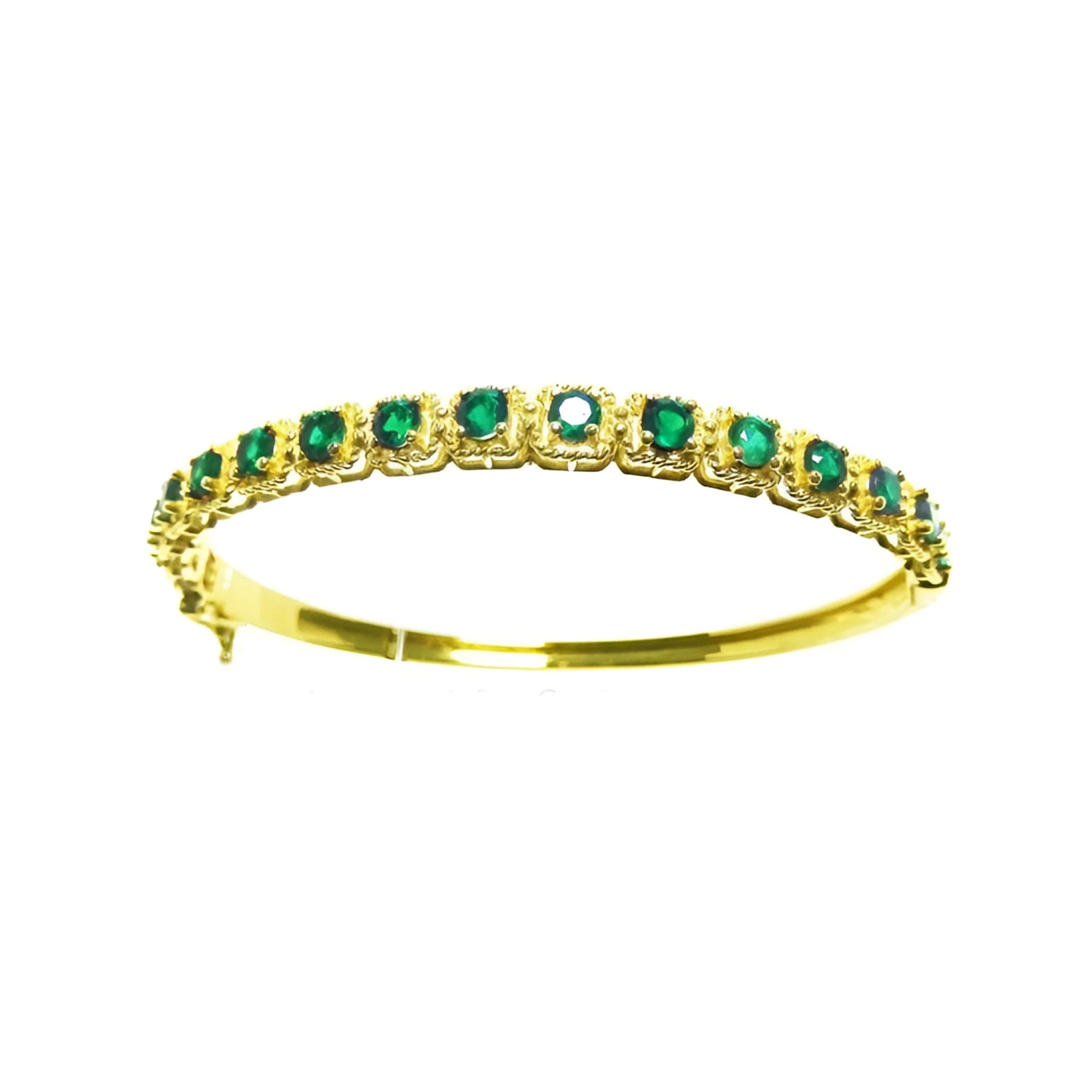 
A 14k gold bangle bracelet with round cut natural colombian emeralds brilliant cut sparkling bluish green color.