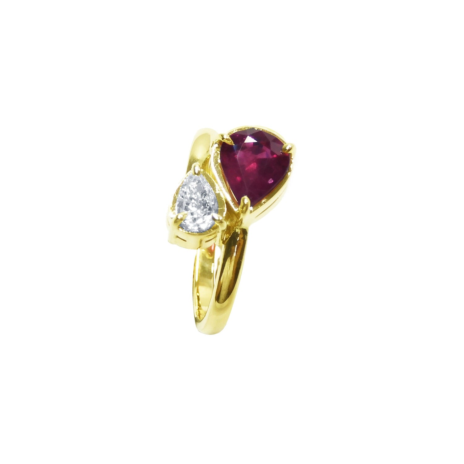 Natural You and Me Ruby Diamond Ring 18K Gold This two stone features a 1.02 ct Burma accentuated by teardrop side