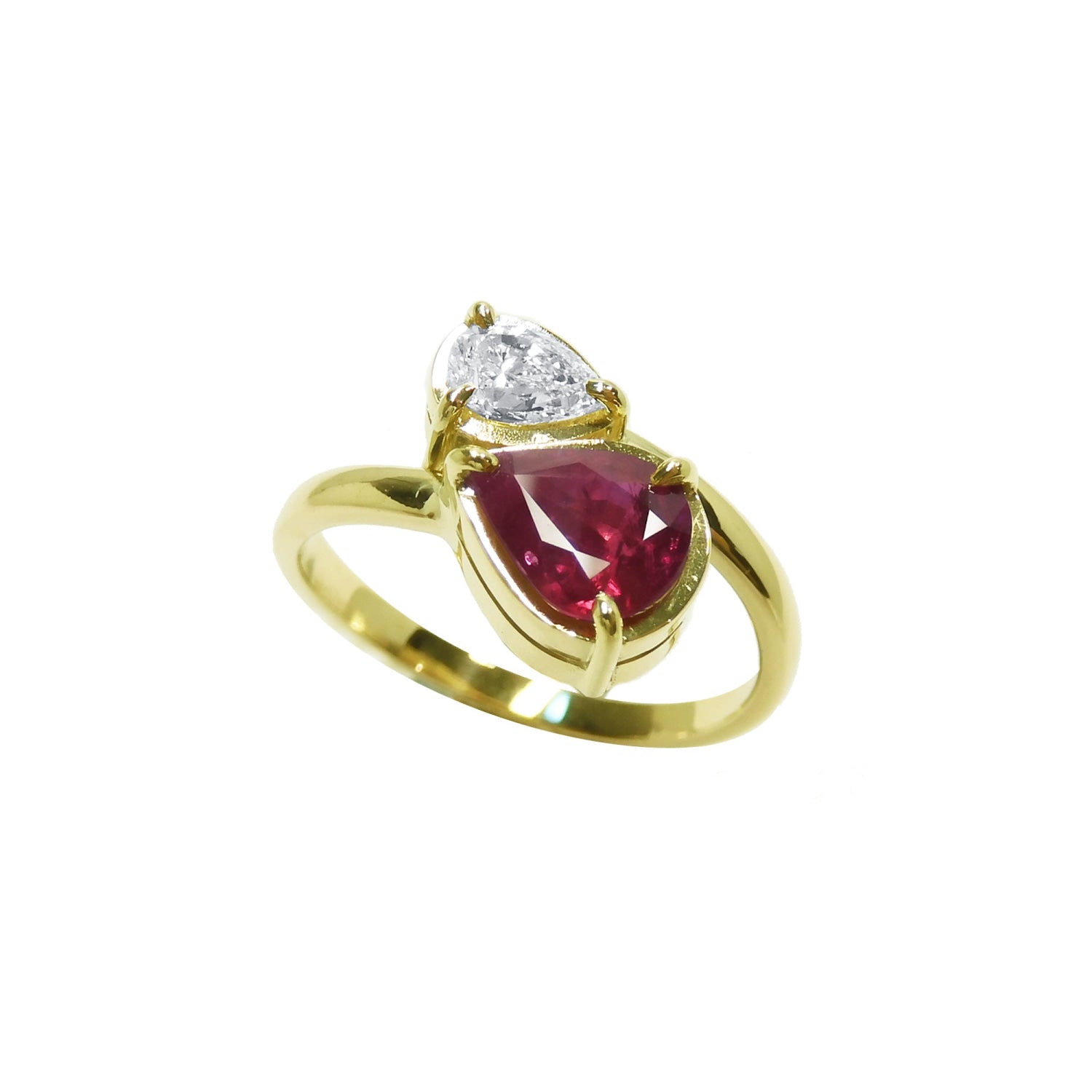 Natural You and Me Ruby Diamond Ring 18K Gold This two stone features a 1.02 ct Burma accentuated by teardrop side
