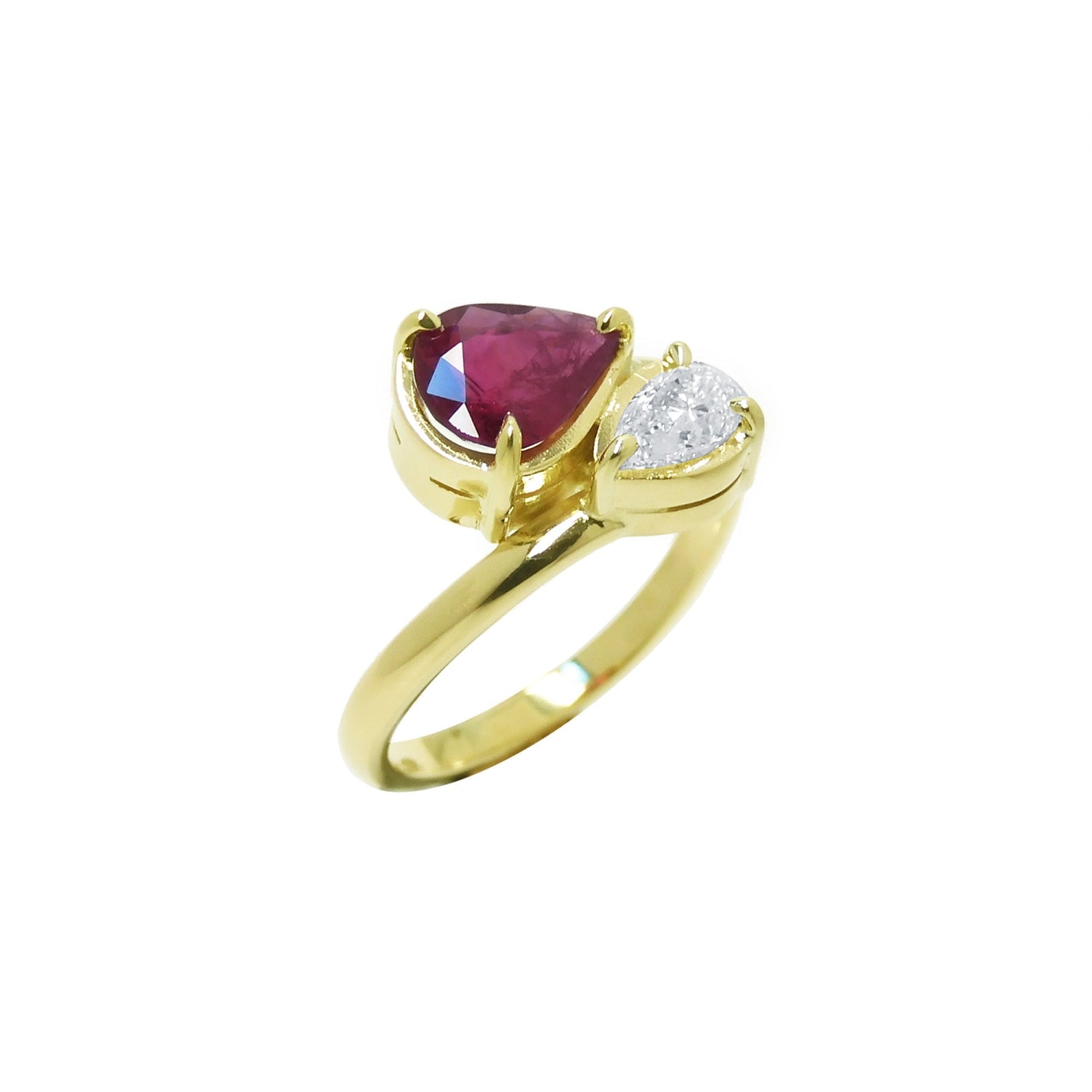 Natural You and Me Ruby Diamond Ring 18K Gold This two stone features a 1.02 ct Burma accentuated by teardrop side