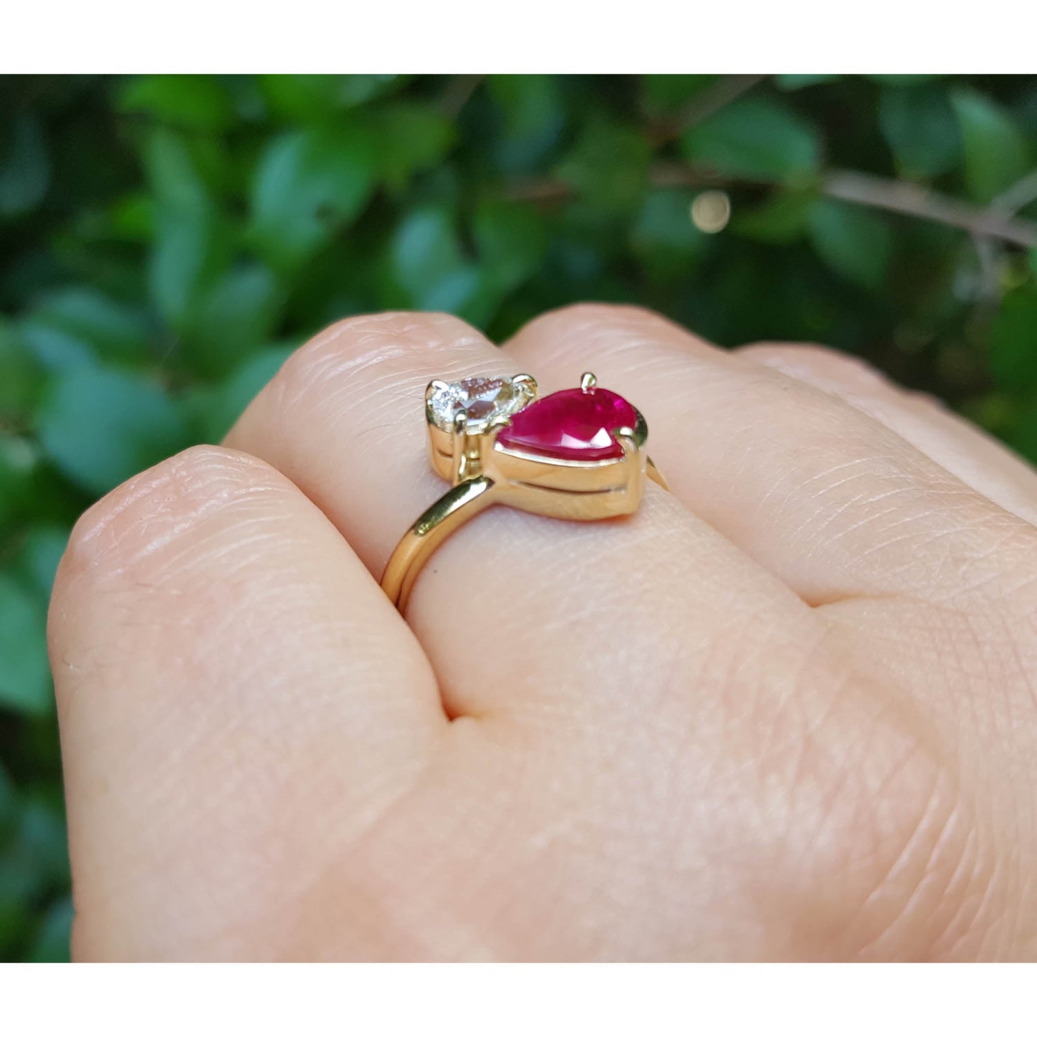 Natural You and Me Ruby Diamond Ring 18K Gold This two stone features a 1.02 ct Burma accentuated by teardrop side