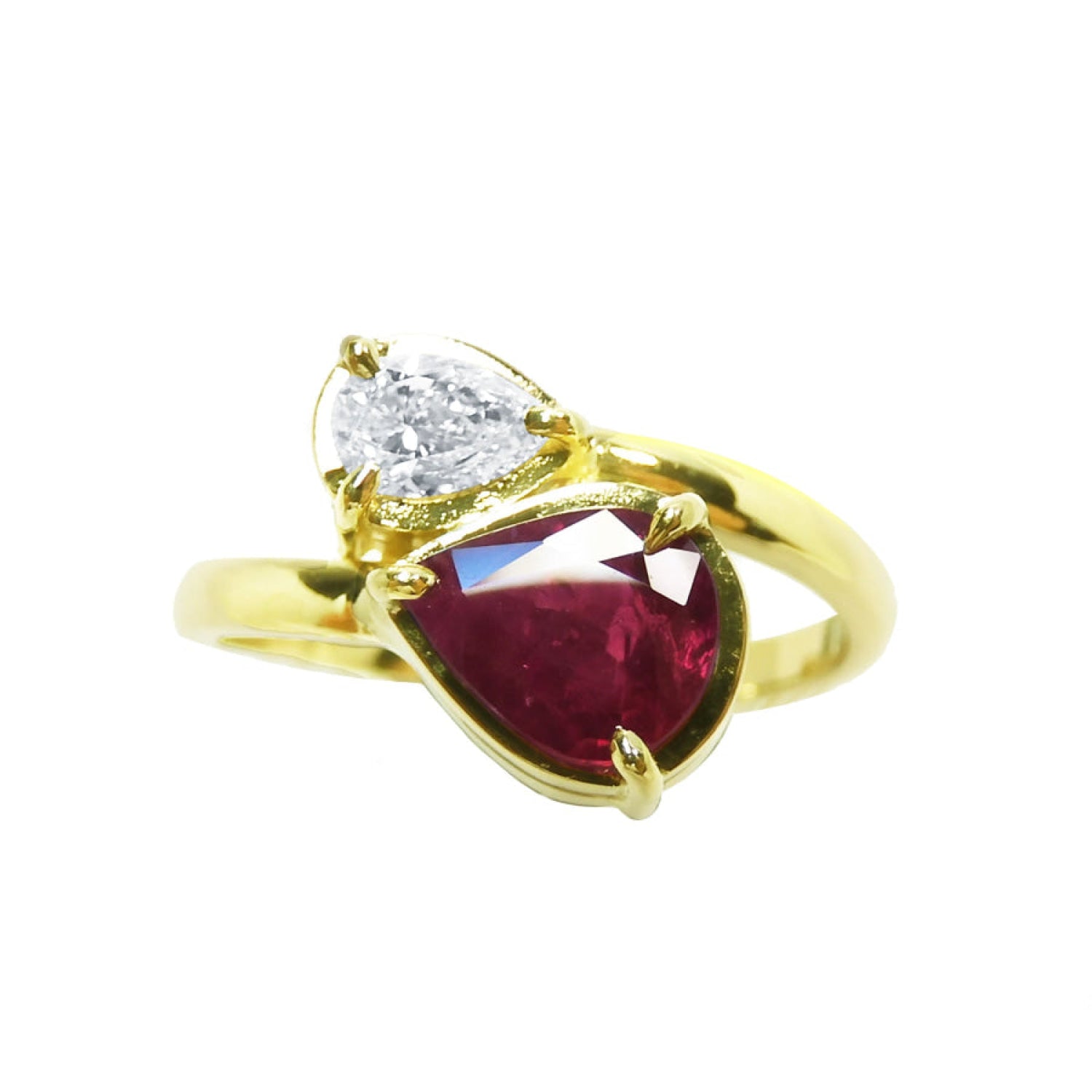 Natural You and Me Ruby Diamond Ring 18K Gold This two stone features a 1.02 ct Burma accentuated by teardrop side diamond.