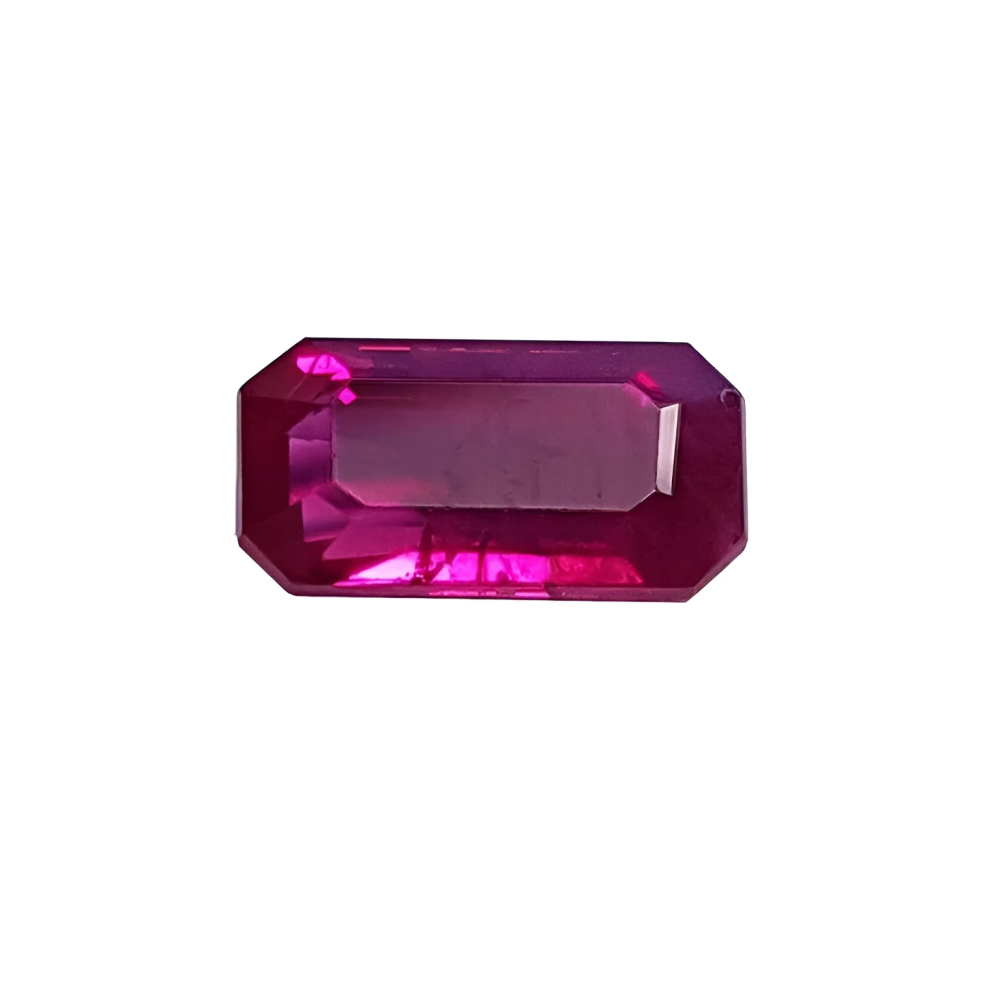 1.11 carat natural emerald-cut ruby gemstone with deep pinkish-red color.