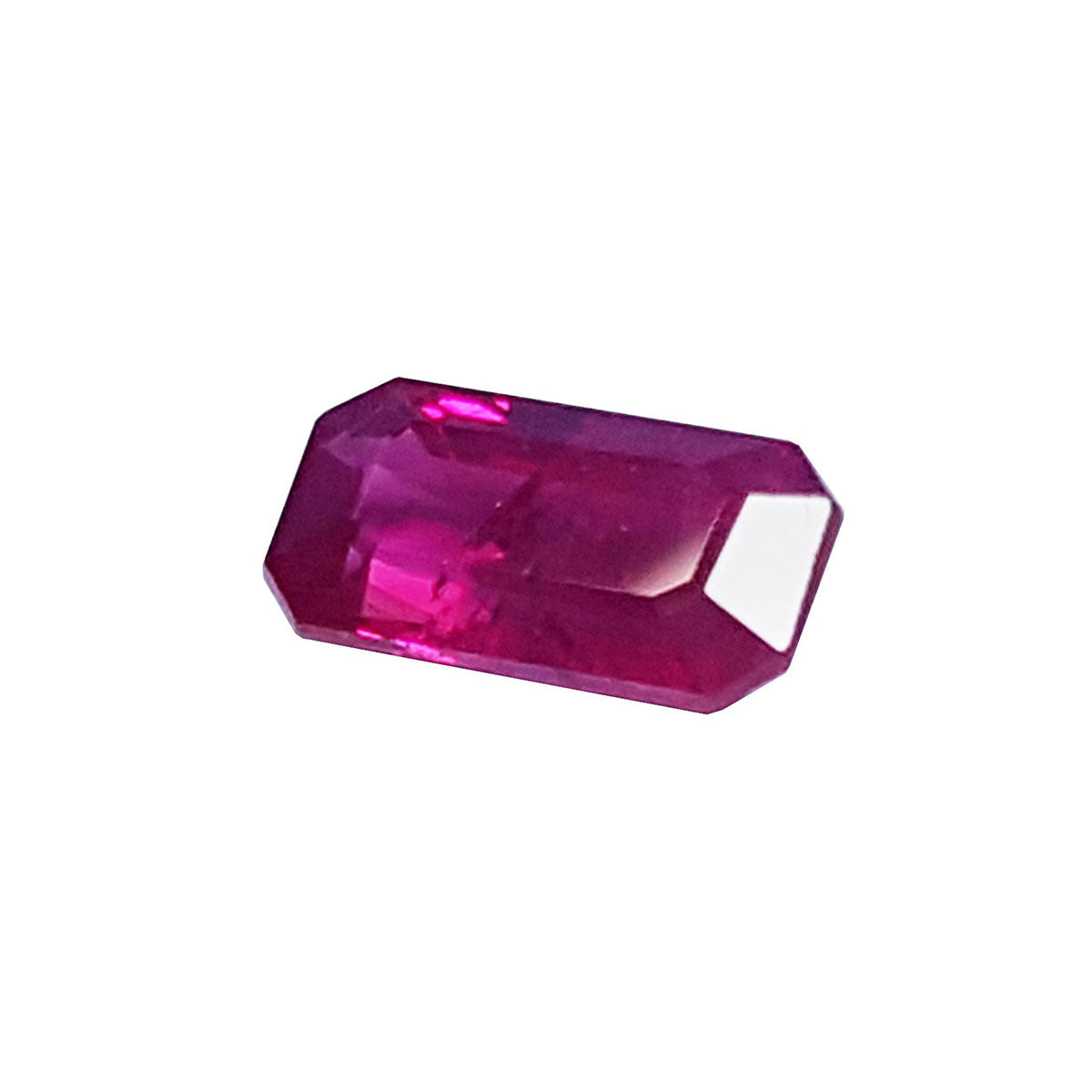 Loose ruby natural gemstone emerald cut 1.11 ct. left side position table and crown visibles