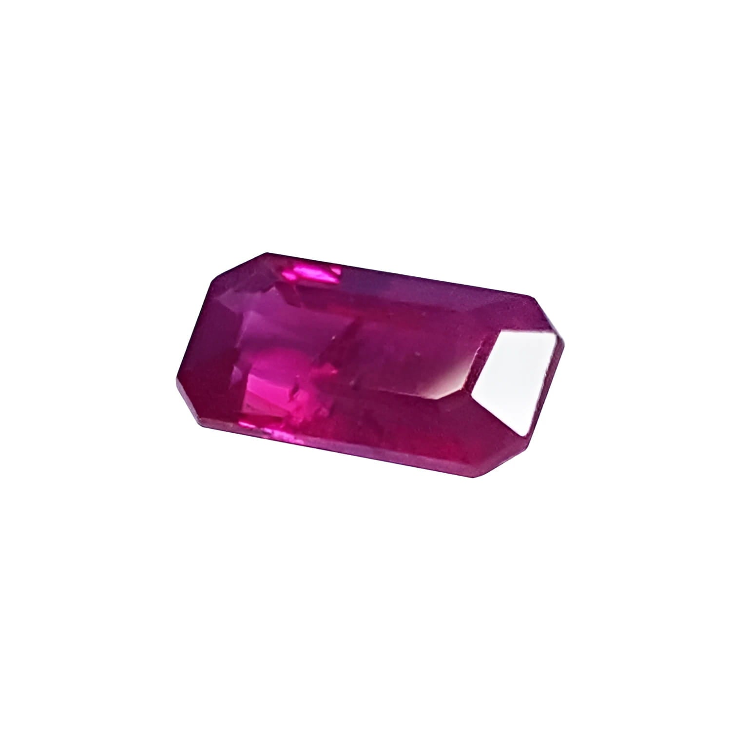 1.11 carat natural ruby gemstone, emerald cut, vibrant purplish-red, loose.
