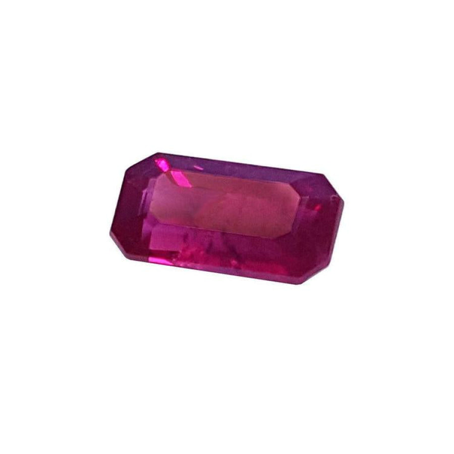 1.11 carat natural emerald-cut ruby gemstone with deep pink-red hue.