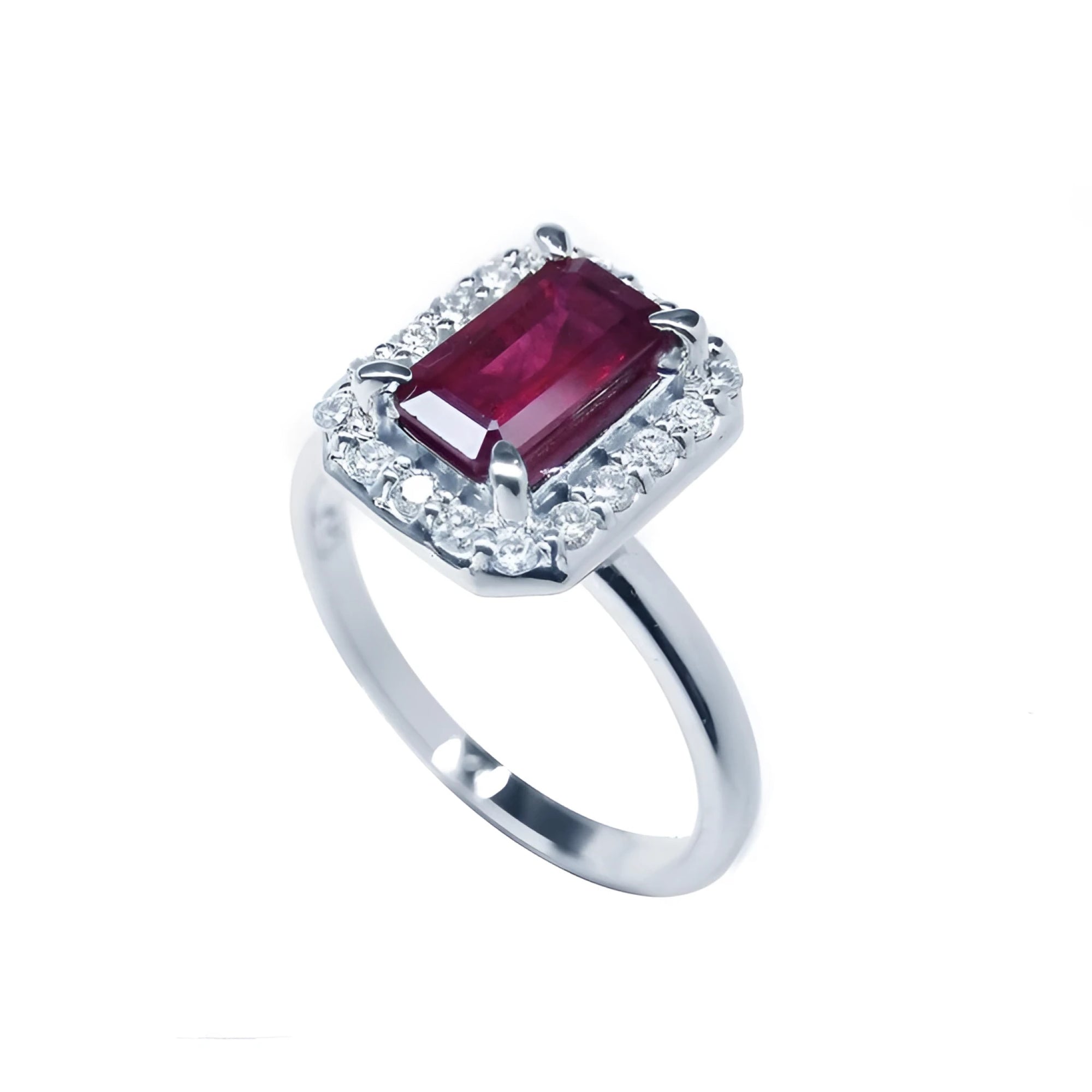 Women's 14K white gold ring with an emerald-cut deep red ruby and diamond halo.