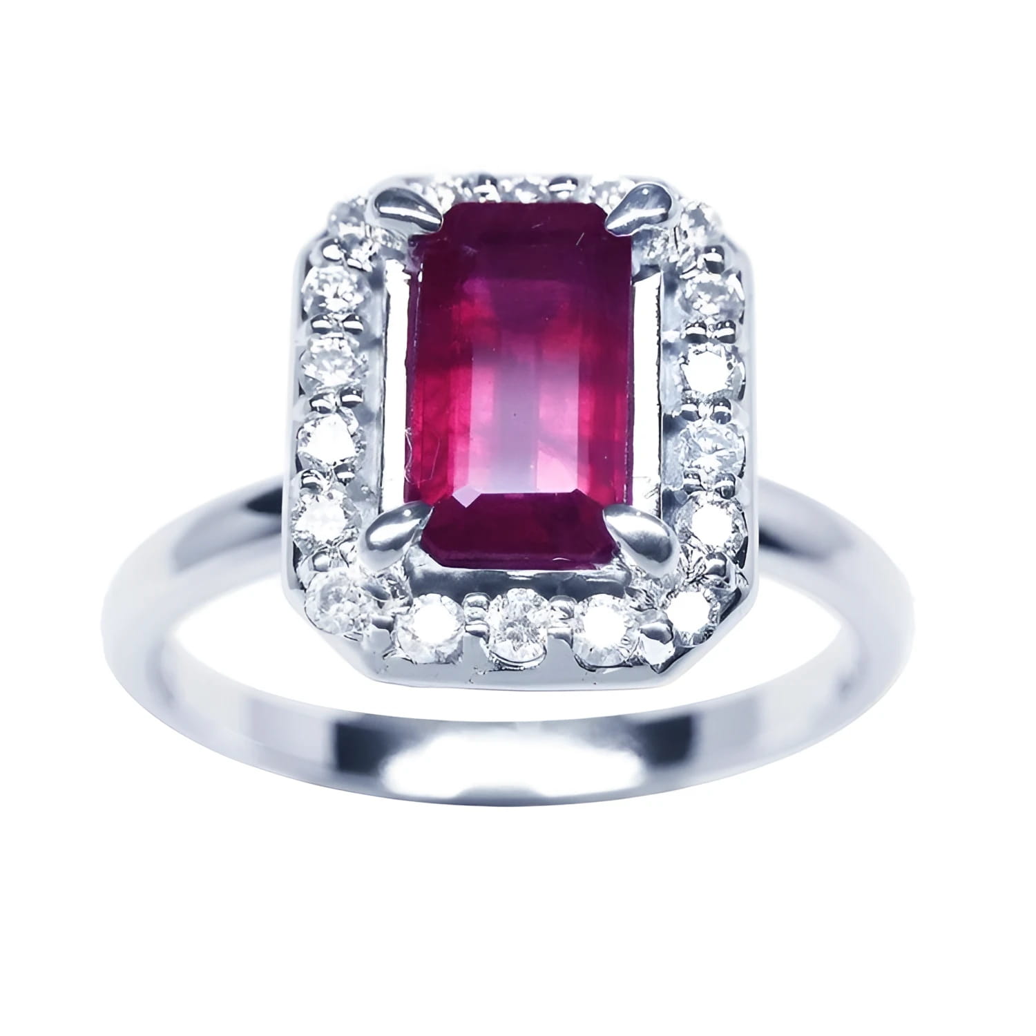 Emerald-cut ruby ring with diamond halo in 14K white gold.