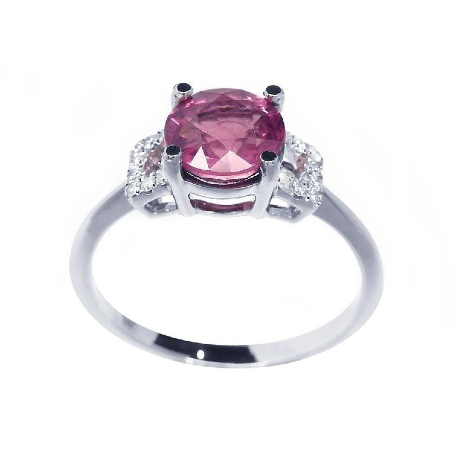 Round cut pinkish-red ruby ring with accented diamonds, prong set in 14k white gold.