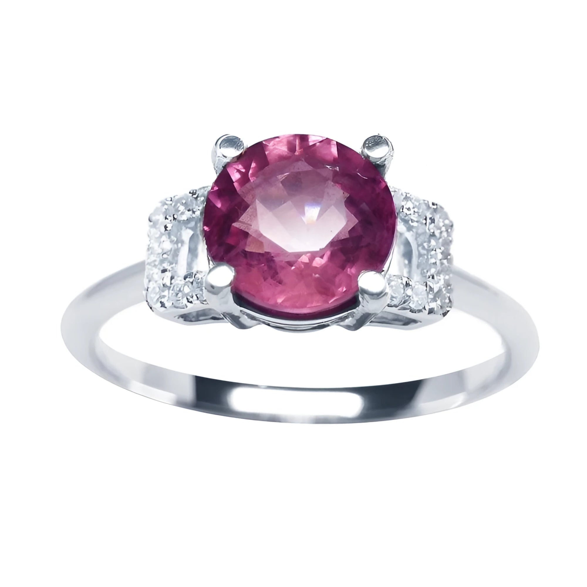 Round cut pinkish-red ruby ring with diamond accents, prong set in 14k white gold.