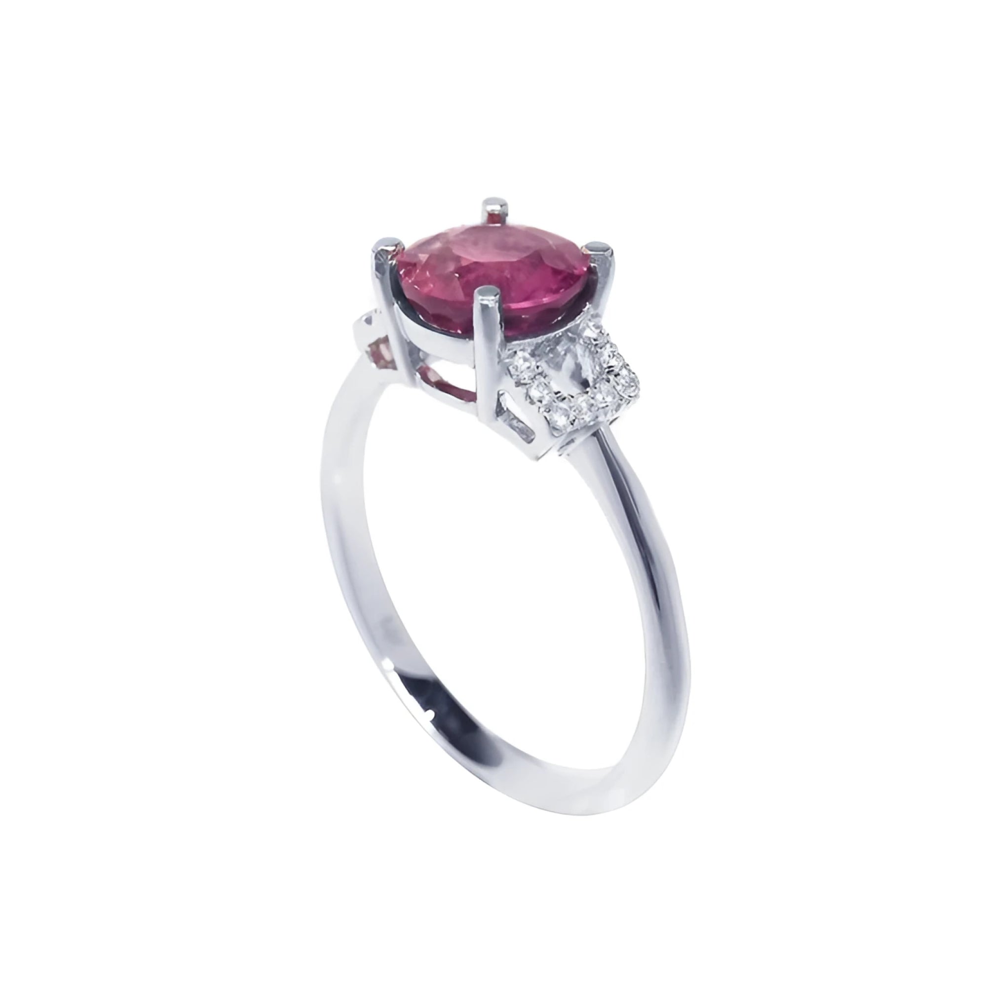 Round cut natural ruby ring with pinkish-red stone, accented diamonds, set in 14k white gold.