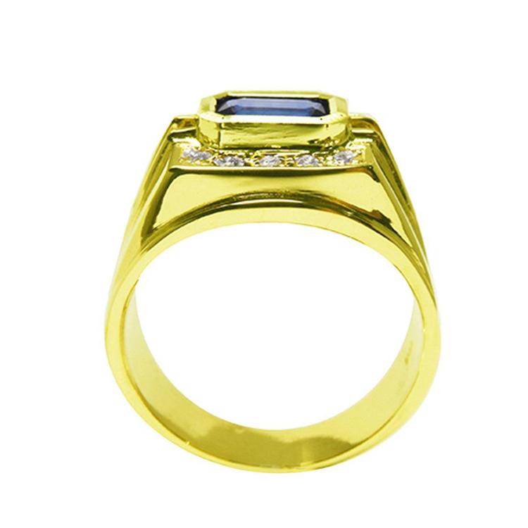 Men's 18K yellow gold ring with an east-west bezel-set blue sapphire and diamond accents.